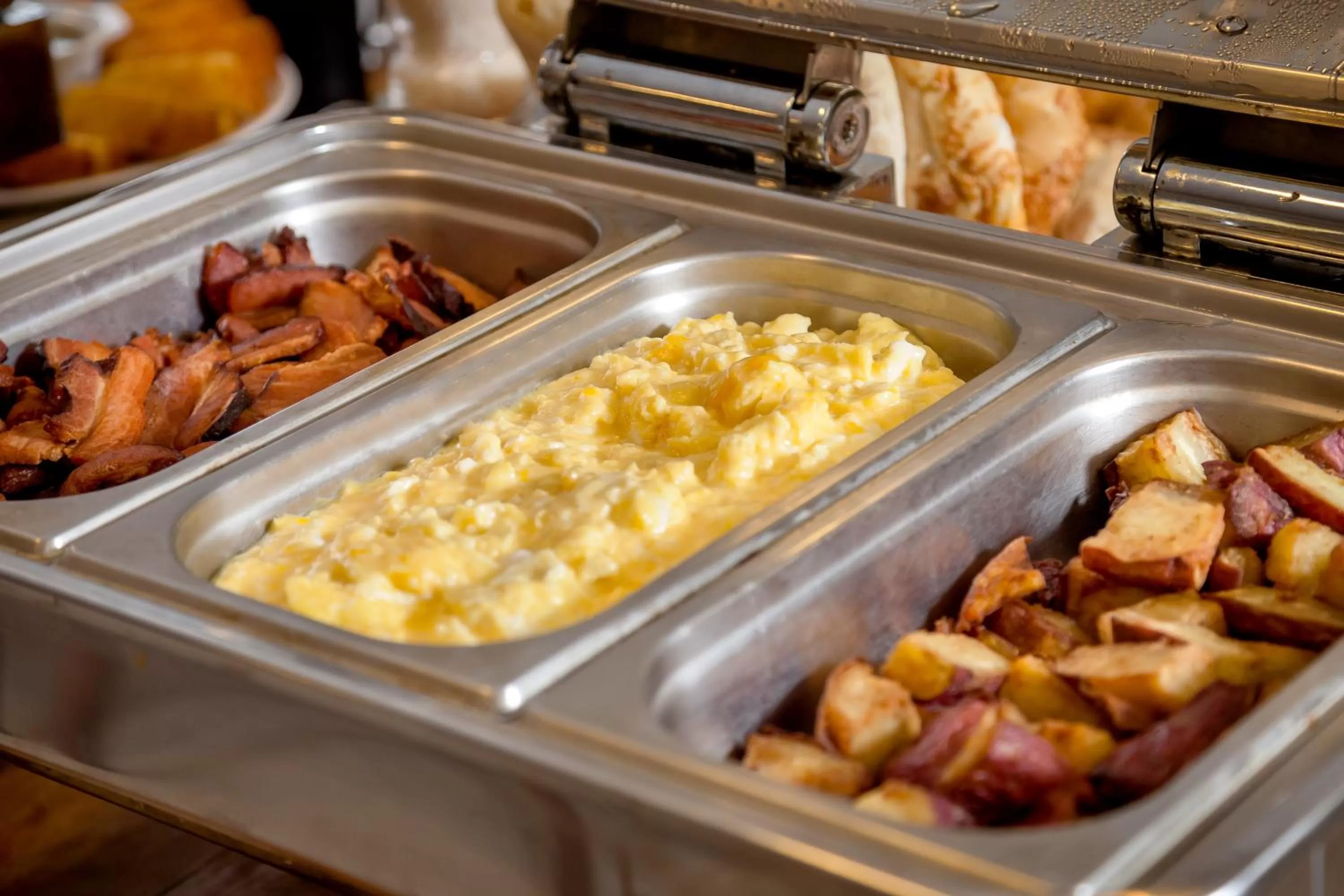 Buffet breakfast in Ramada by Wyndham Macae Hotel & Suites