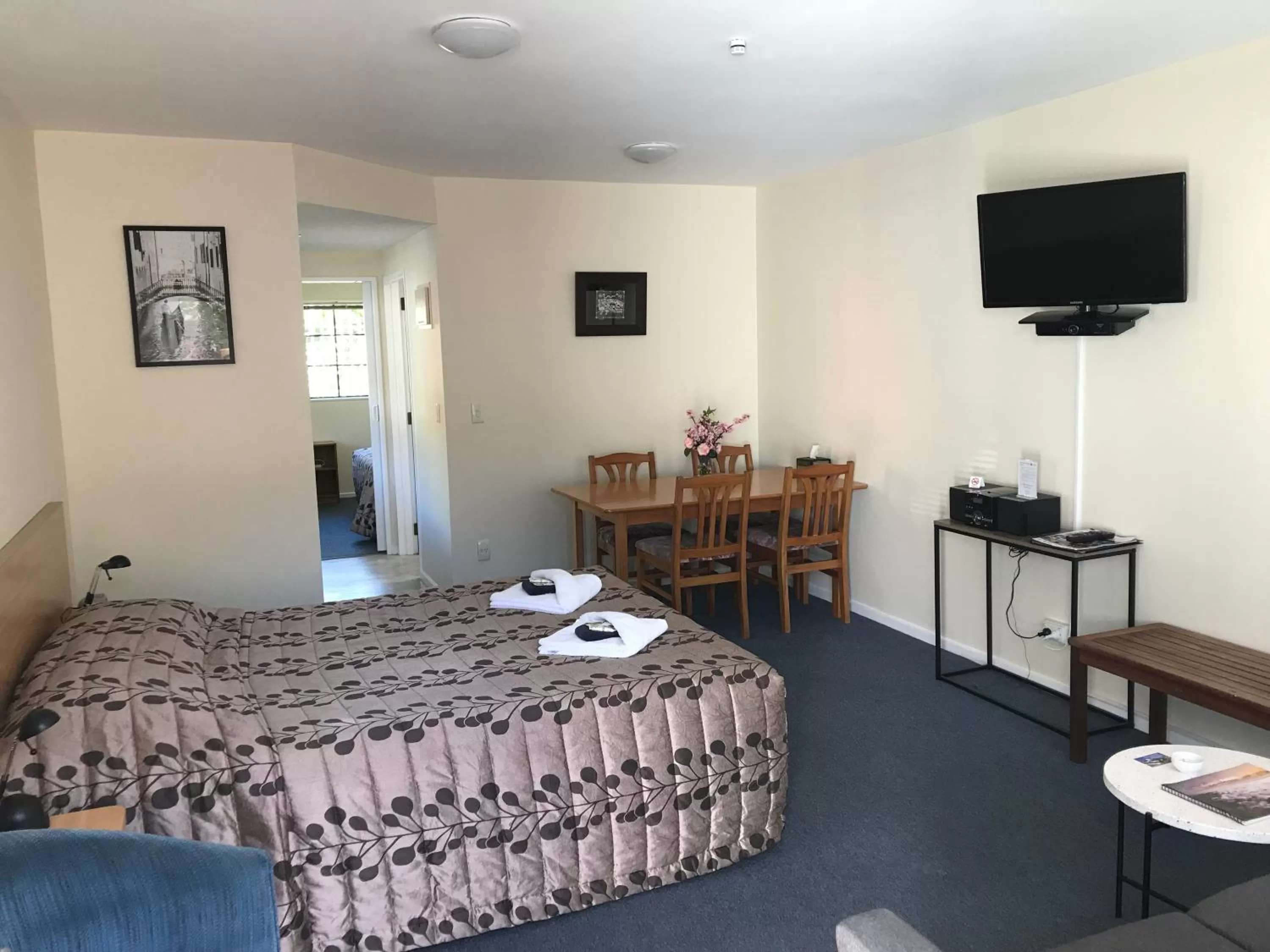 Bed in Tudor Lodge Motel