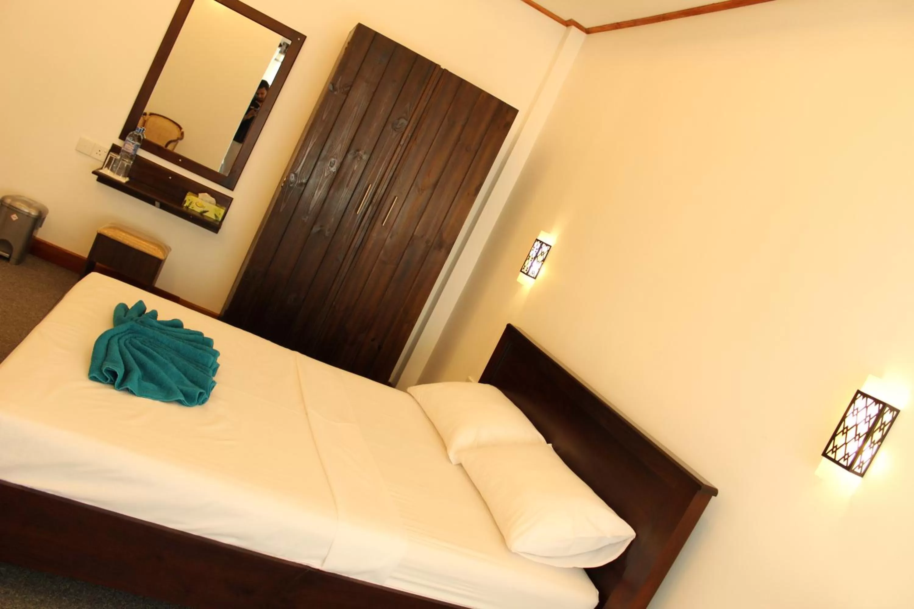 Bed in Nico Lagoon Hotel