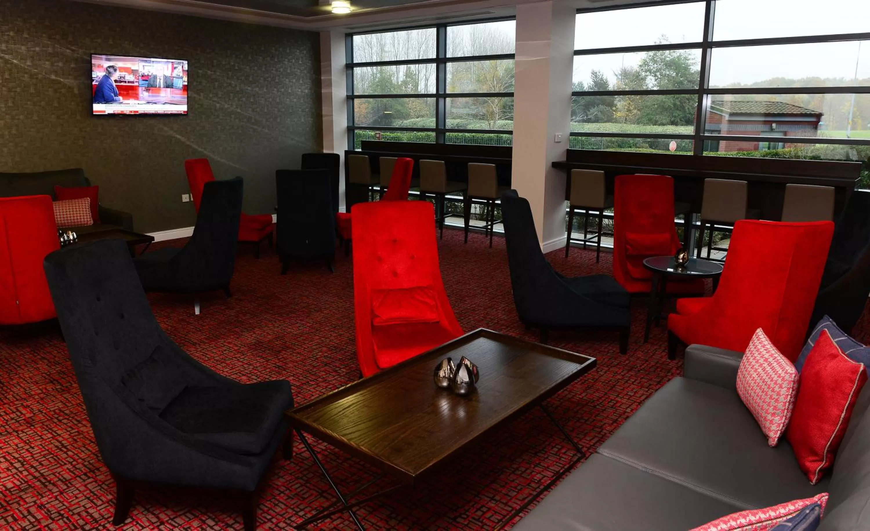 Communal lounge/ TV room in International Hotel Telford