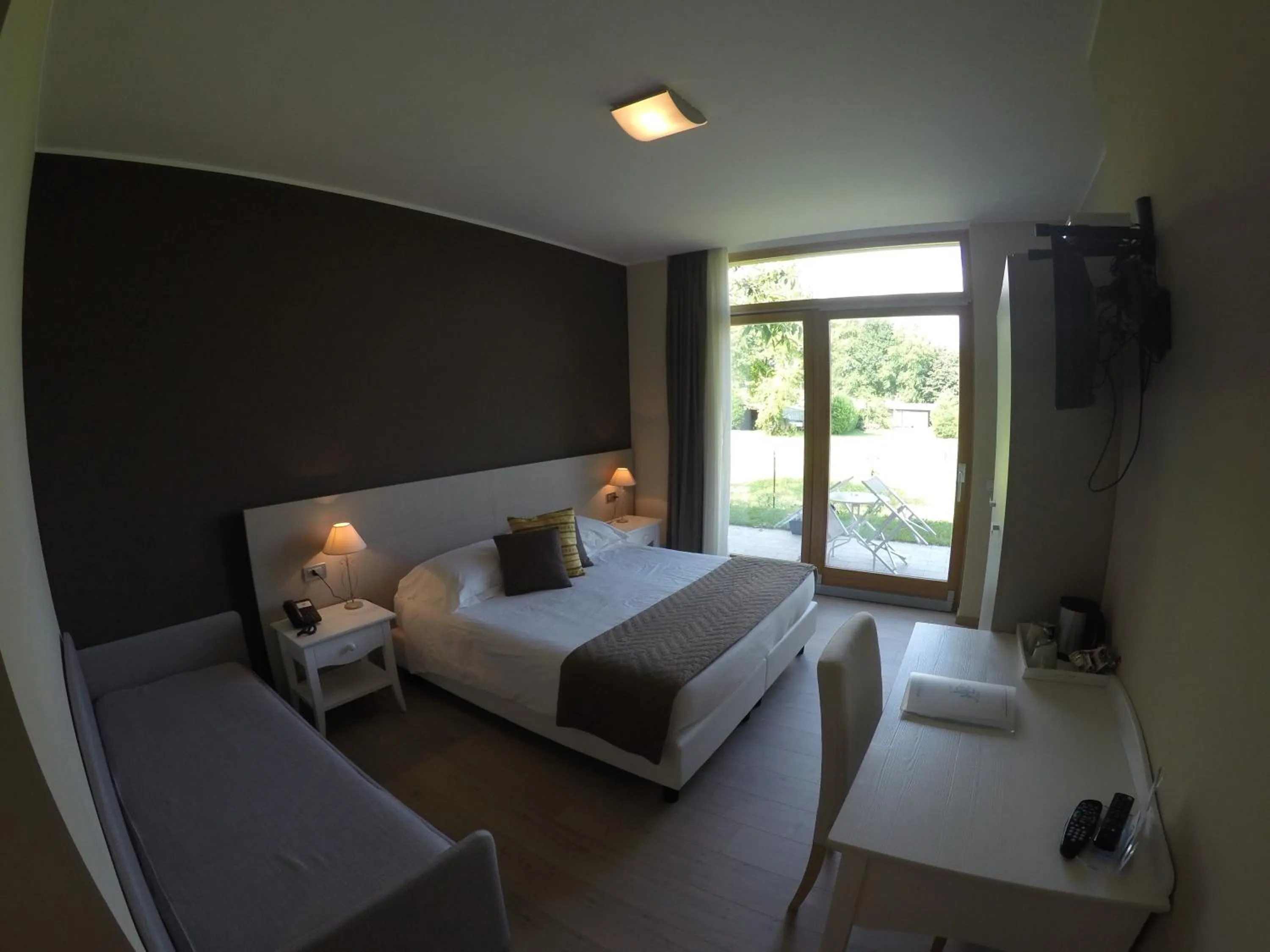 Photo of the whole room, Bed in Tullio Hotel