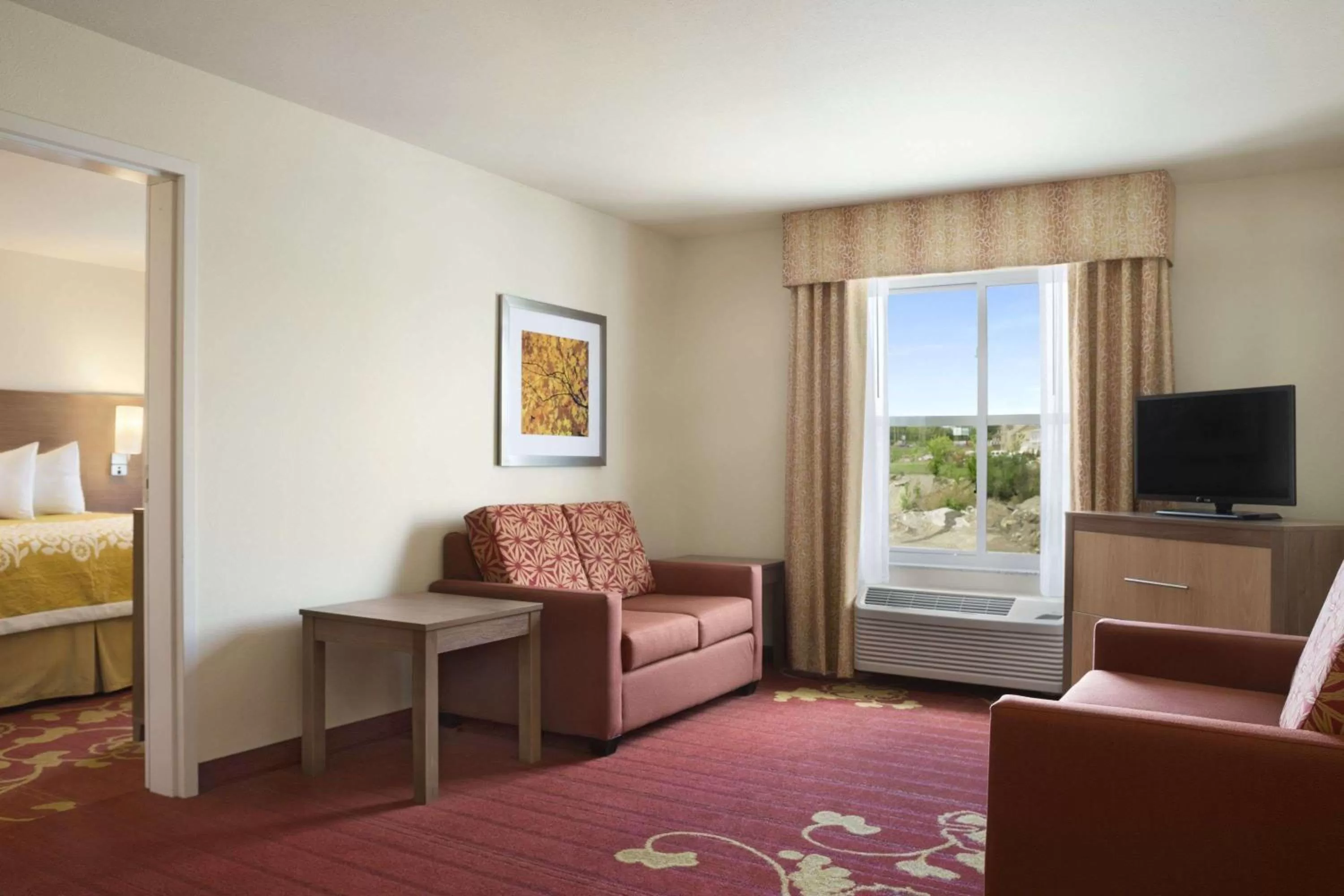 Photo of the whole room, Bed in Days Inn & Suites by Wyndham Belmont