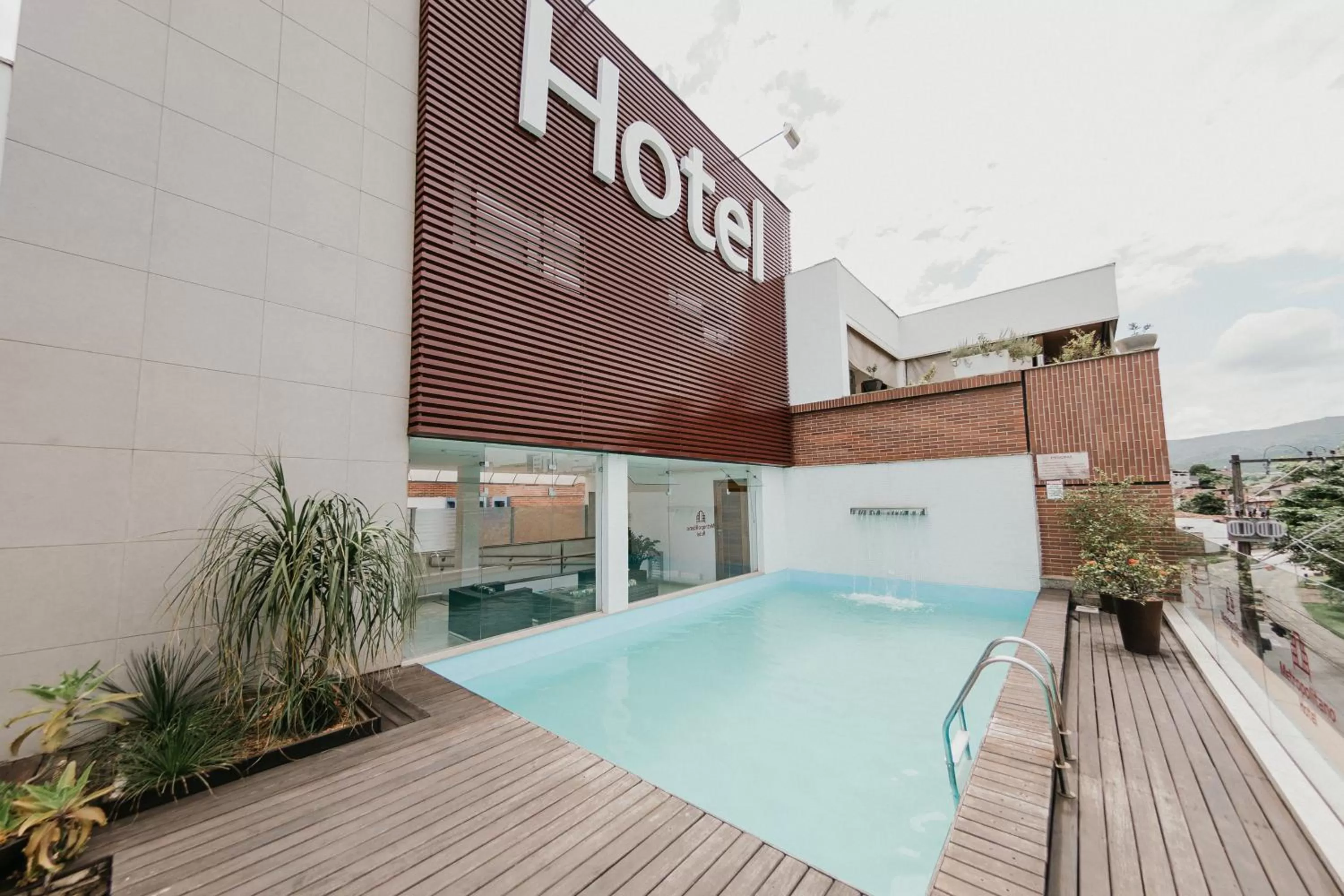 Property logo or sign in Hotel Metropolitano