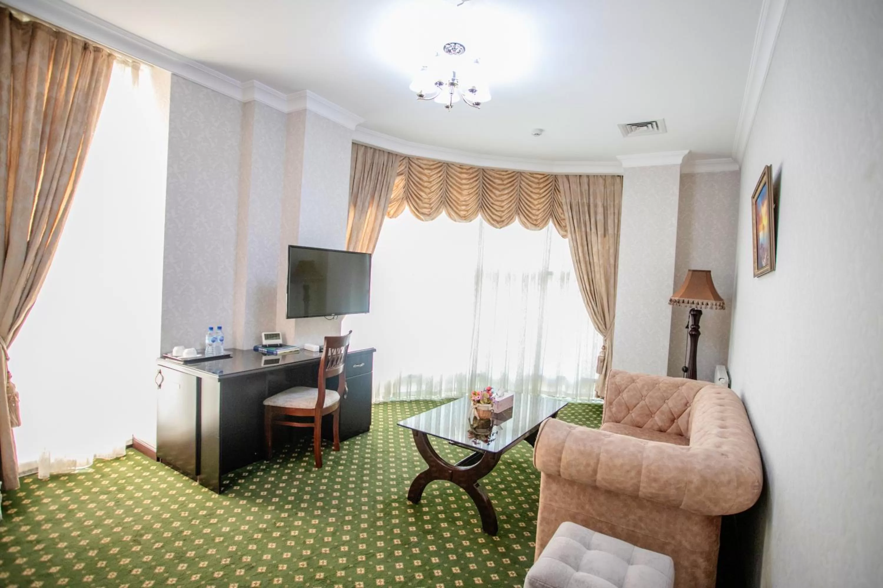 Communal lounge/ TV room in Gloria Hotel