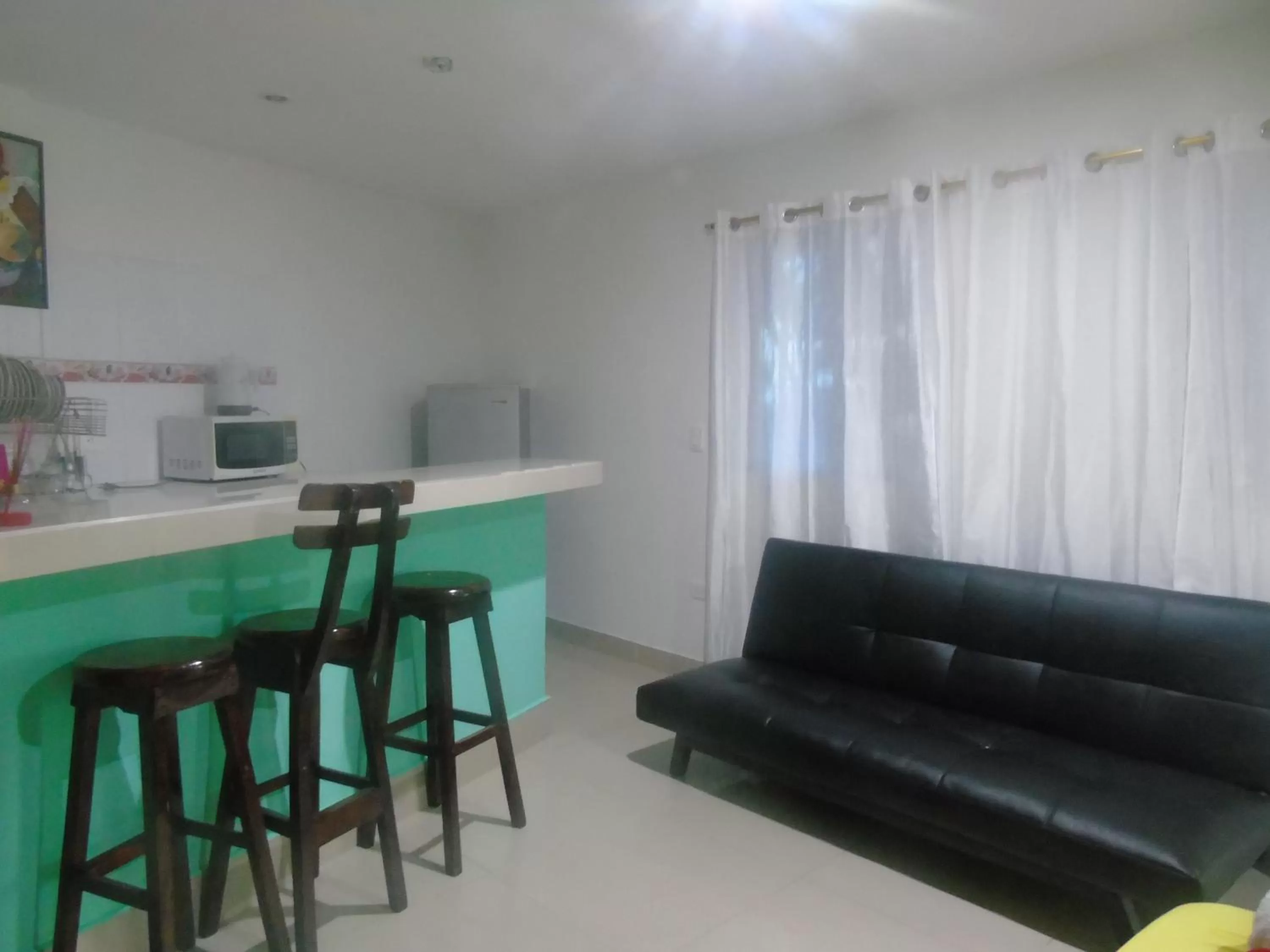Dining area in Posada Miss Joyce House