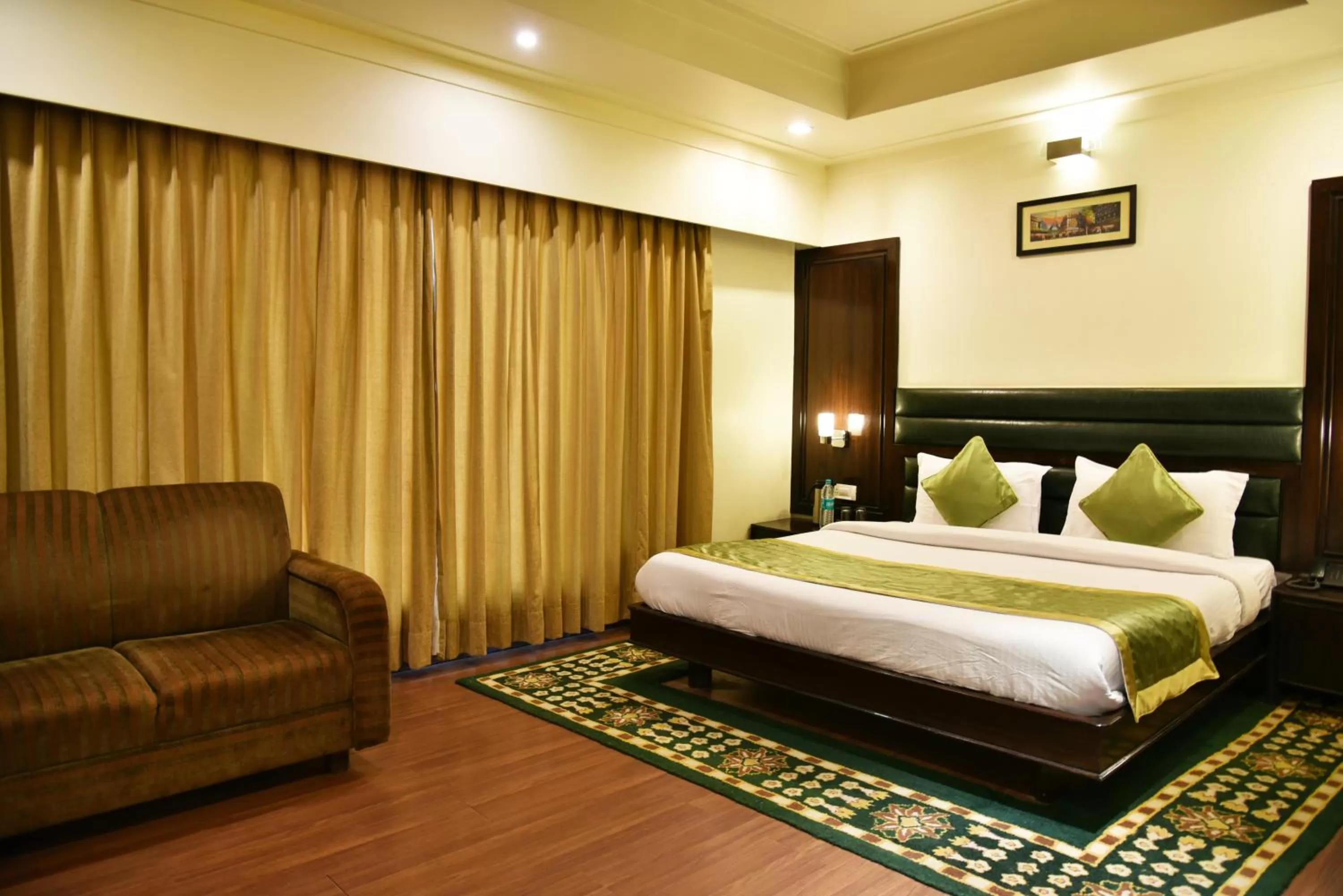 Bedroom, Bed in Indraprastha Resort - Centrally Heated Rooms, with Gym, Games & Spa