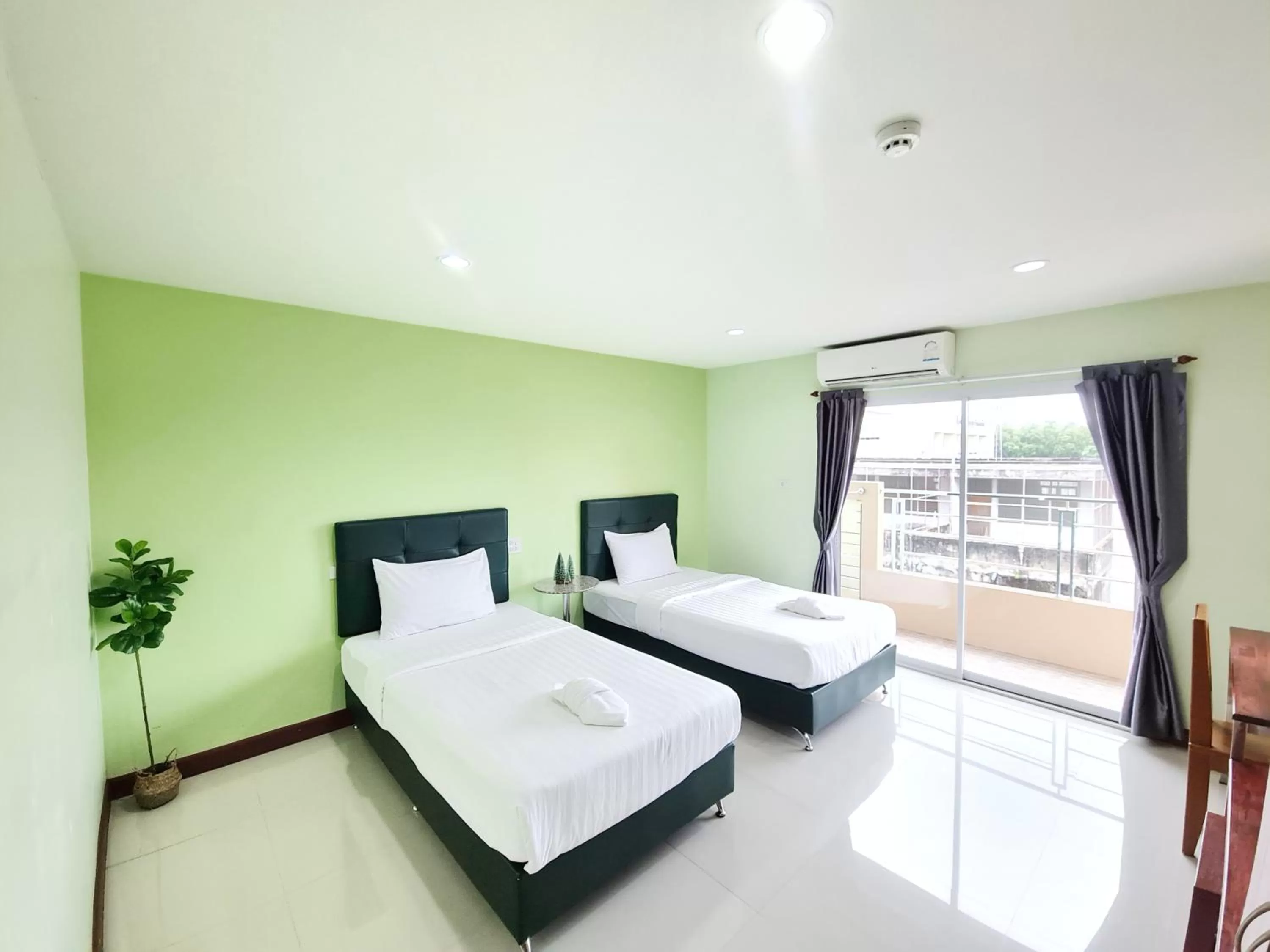 Bed in Jaroonsak Grand