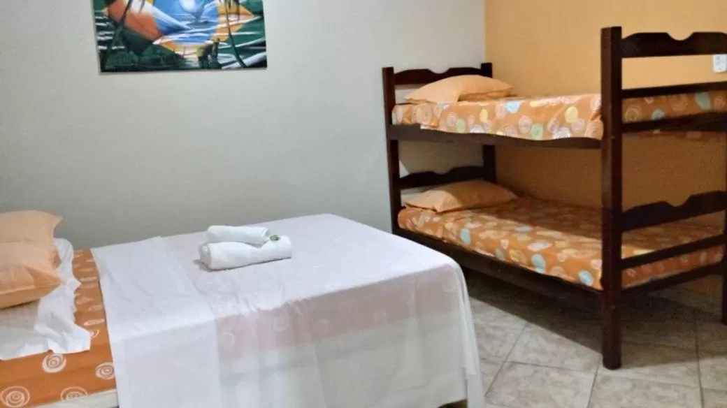 Bed in Pousada da Rose Paraty