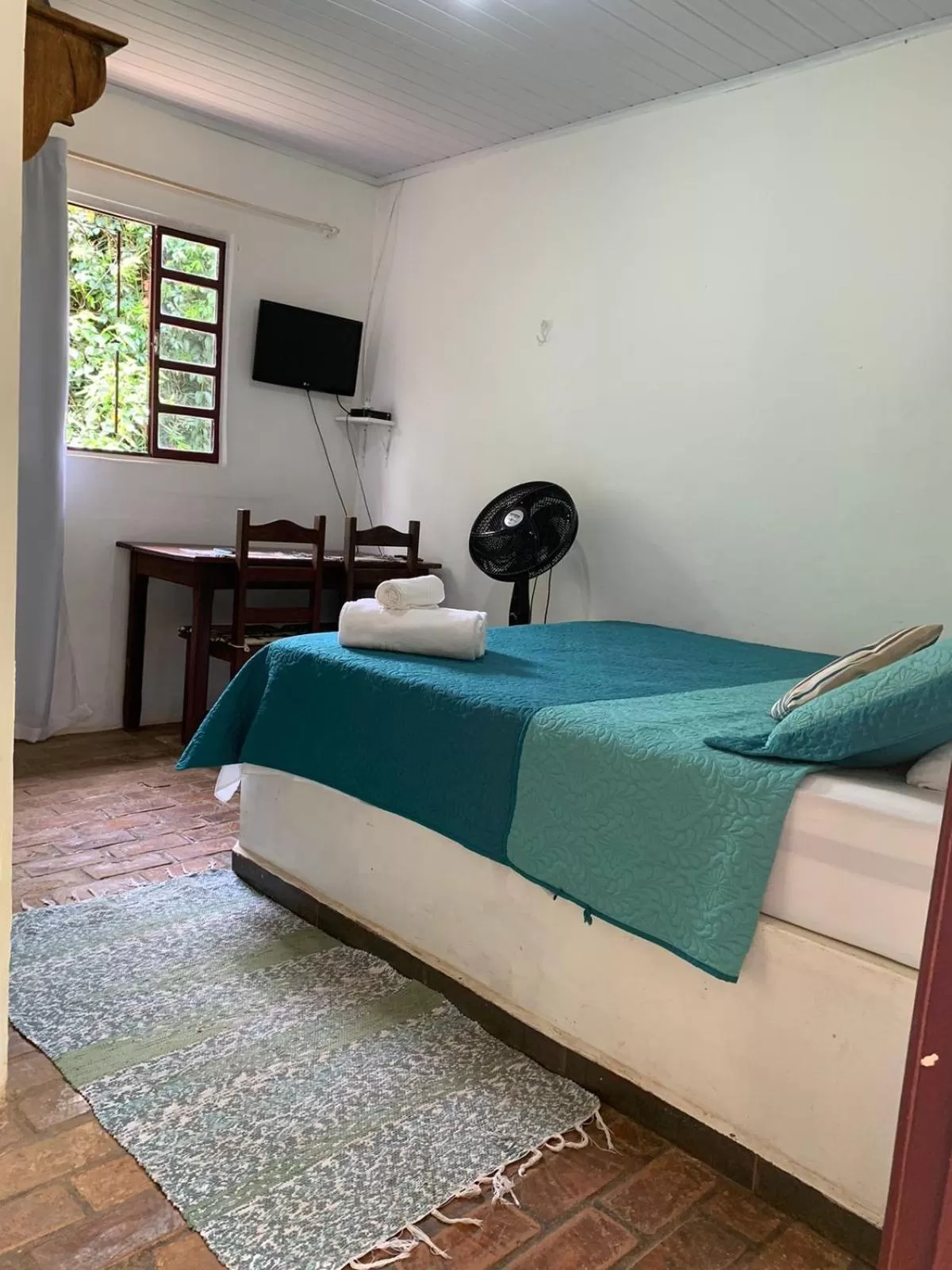 Bed in Pousada Cantinho do Mundo