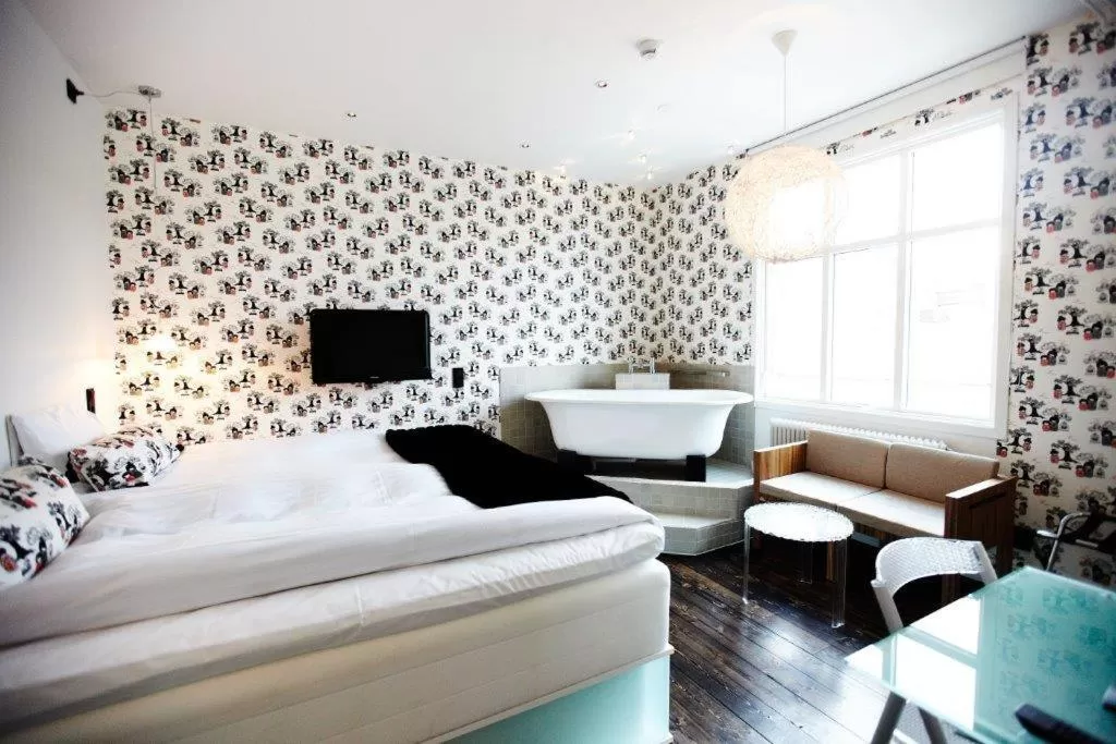 Photo of the whole room, Bed in Huskvarna Stadshotell