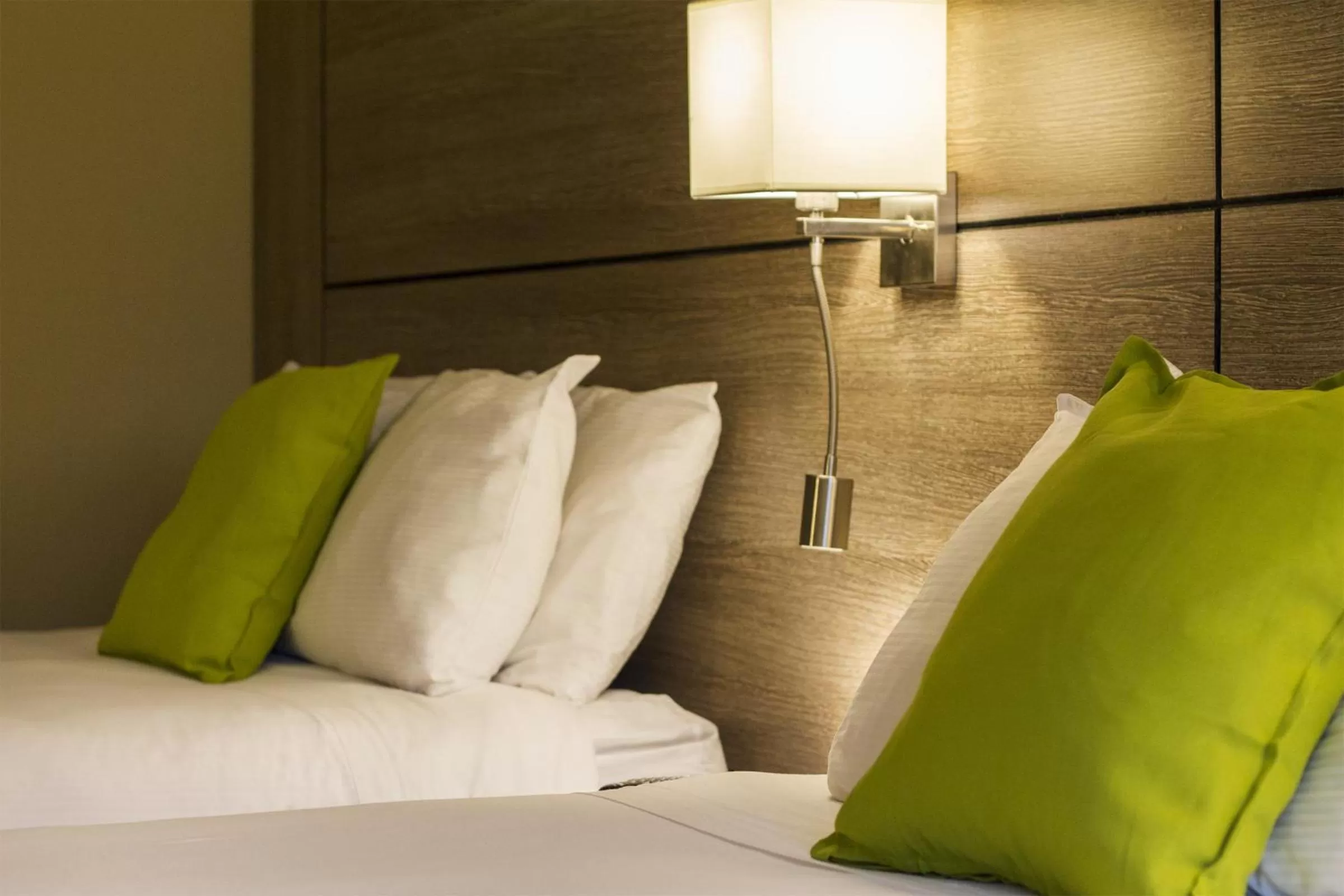 Bed in Living Stone Golf Resort