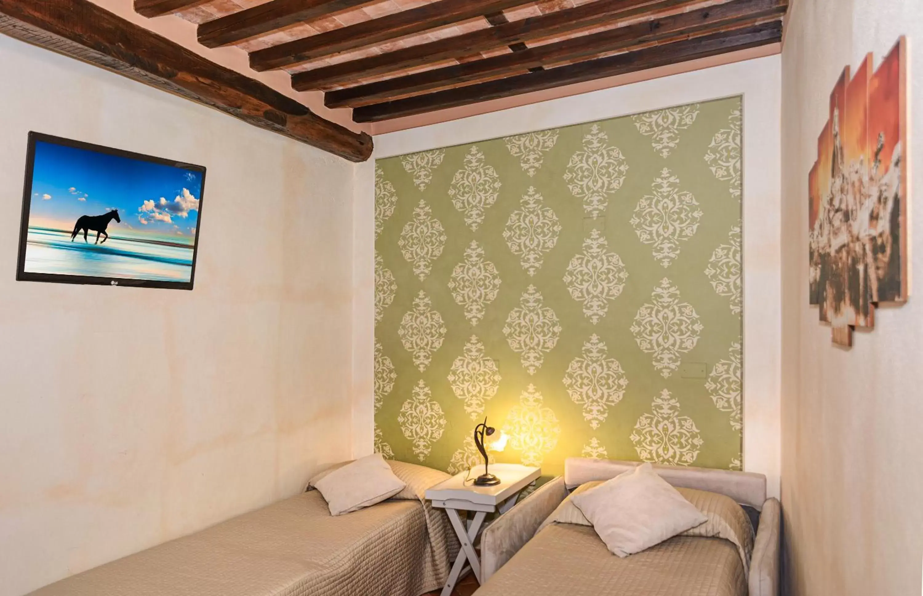 Quadruple Room - Annex in Hotel Villa Cheli Quadruple Room - Annex in Hotel Villa Cheli