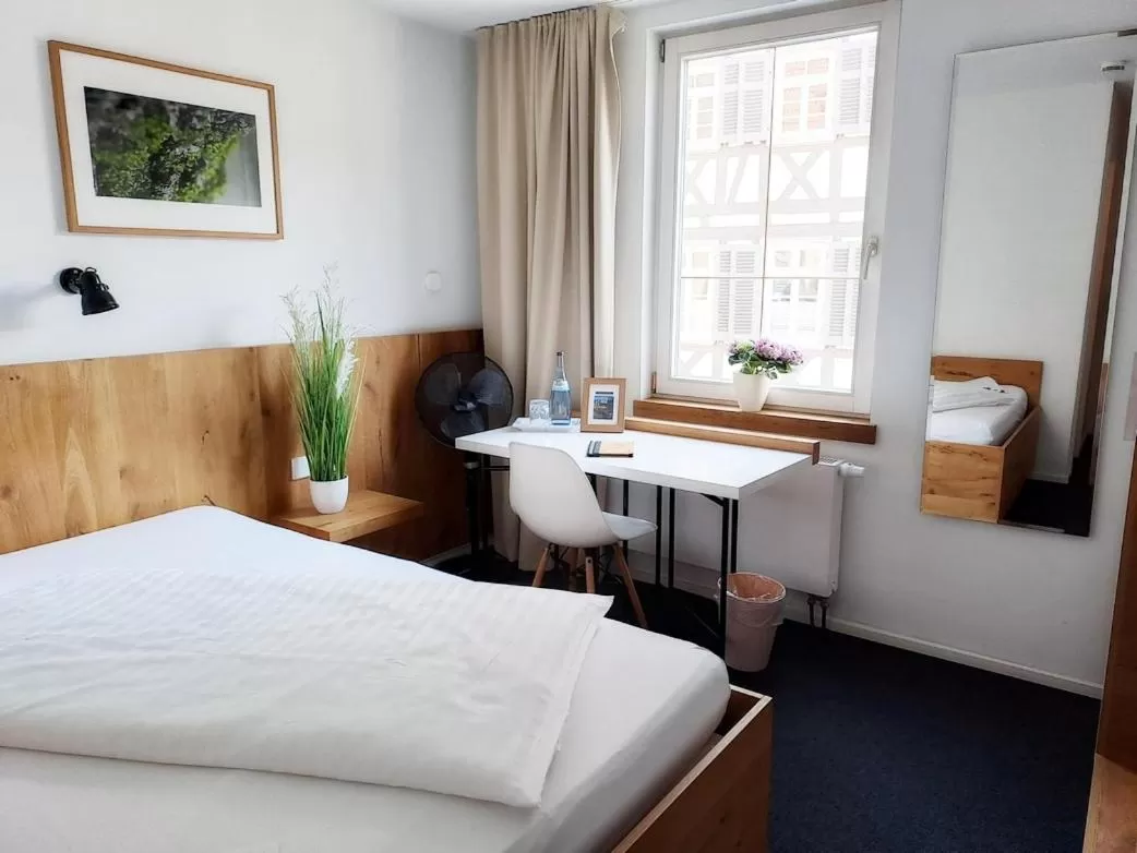 Photo of the whole room, Bed in Stadthotel Waldhorn