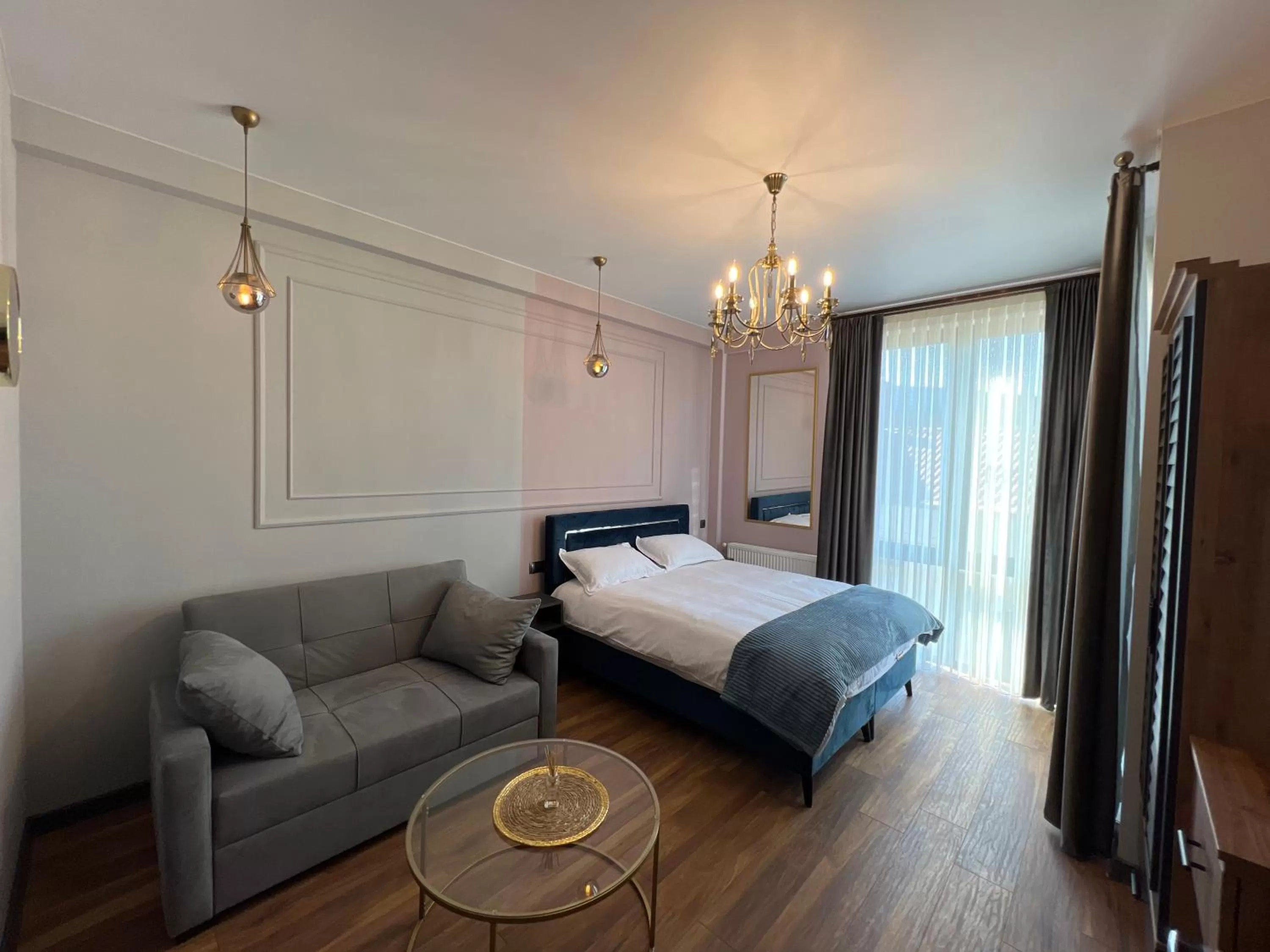 Family Room with Balcony in Trinity Hotel