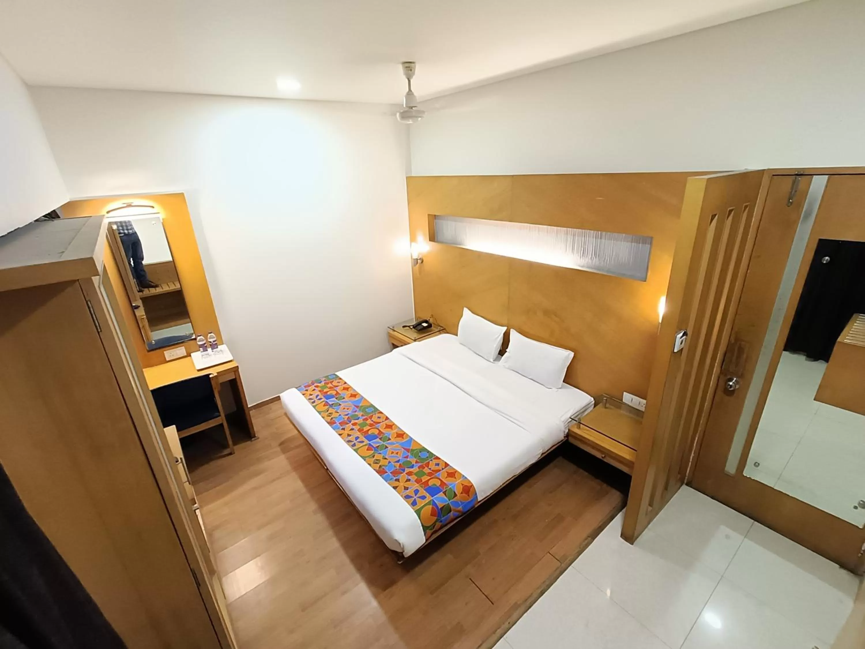 Bed in Rapid Lakme Executive Hotel