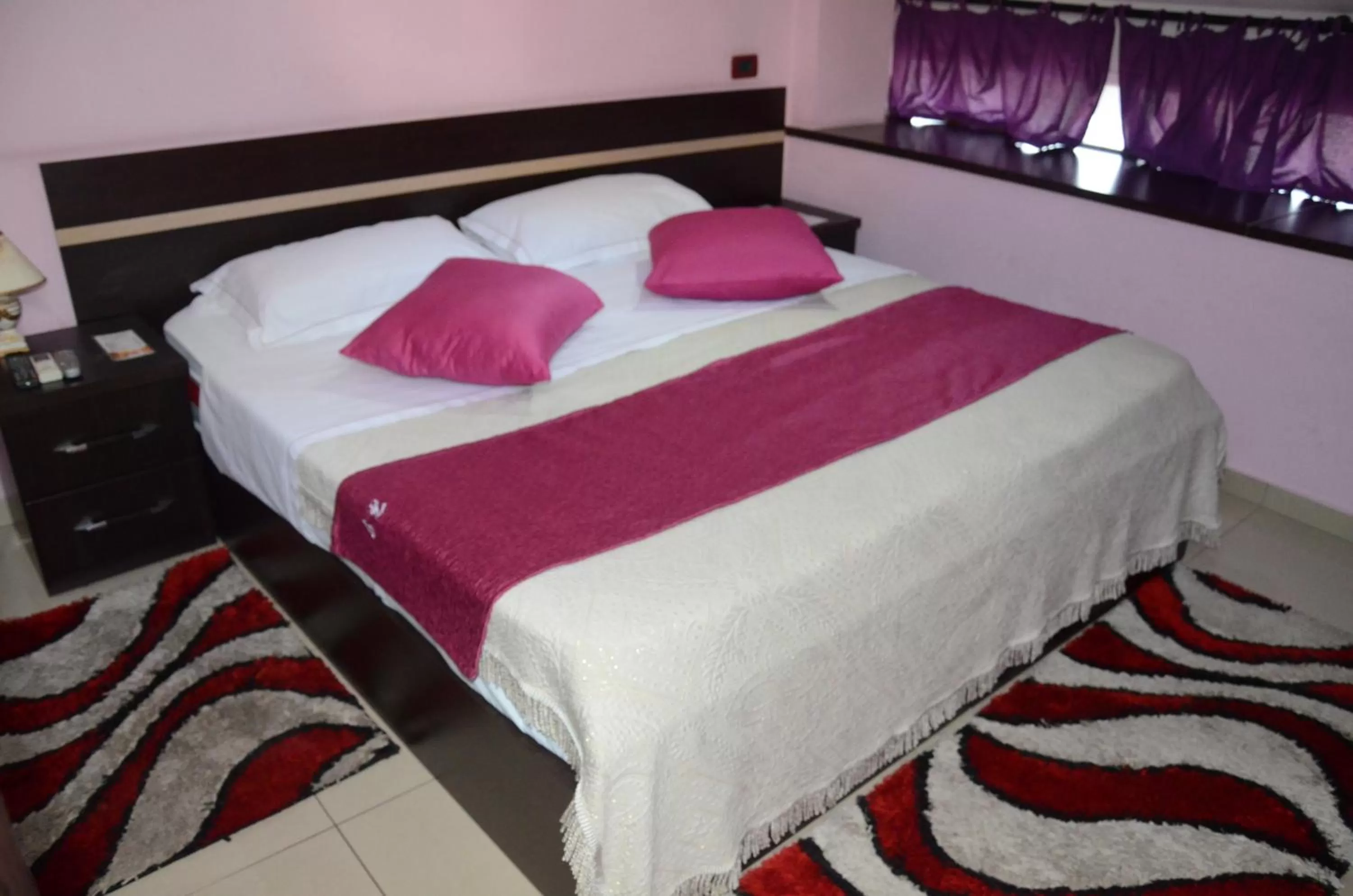 Bed in Jolly City Center Hotel