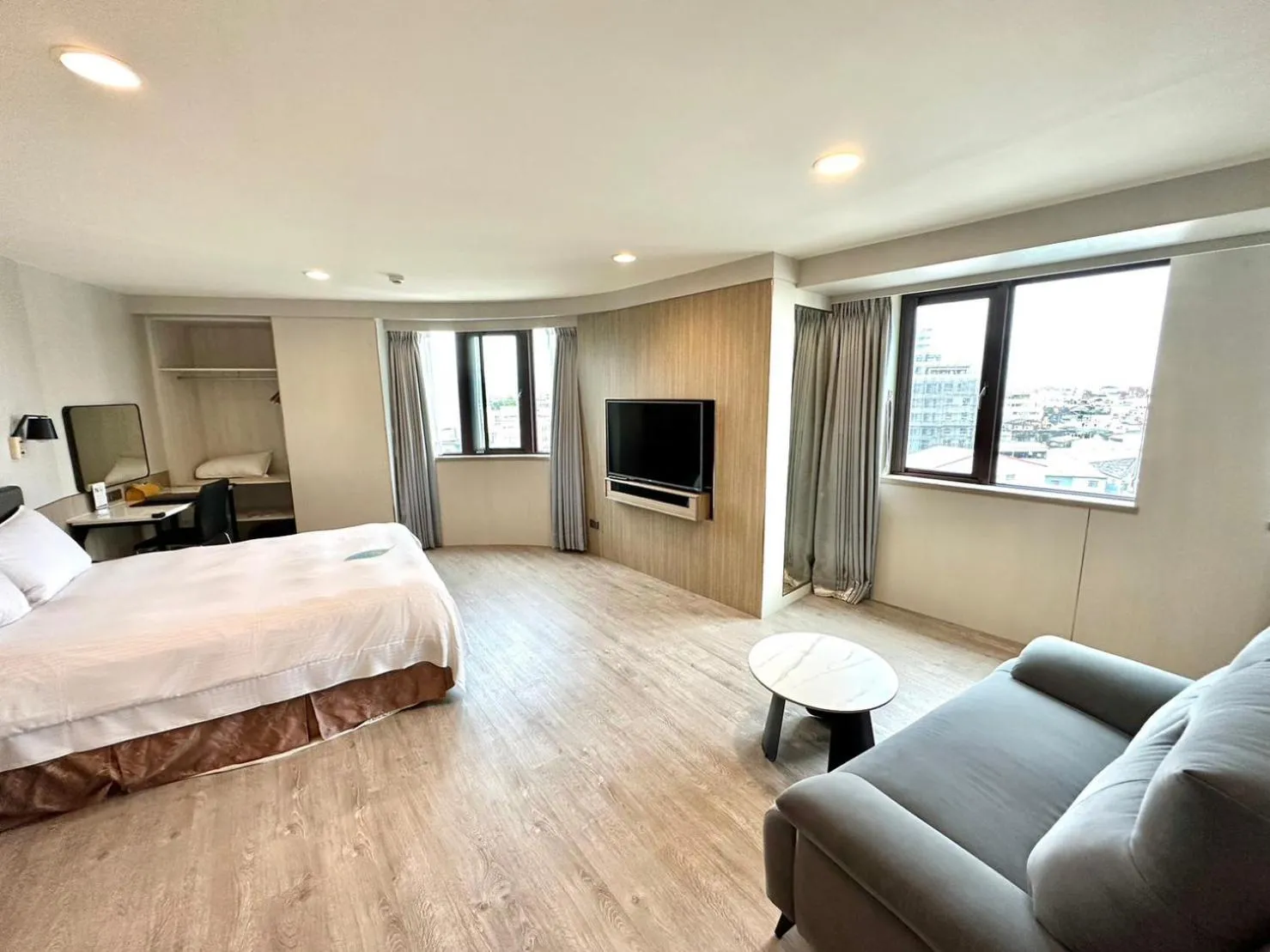 Bed in Grand Earl Hotel