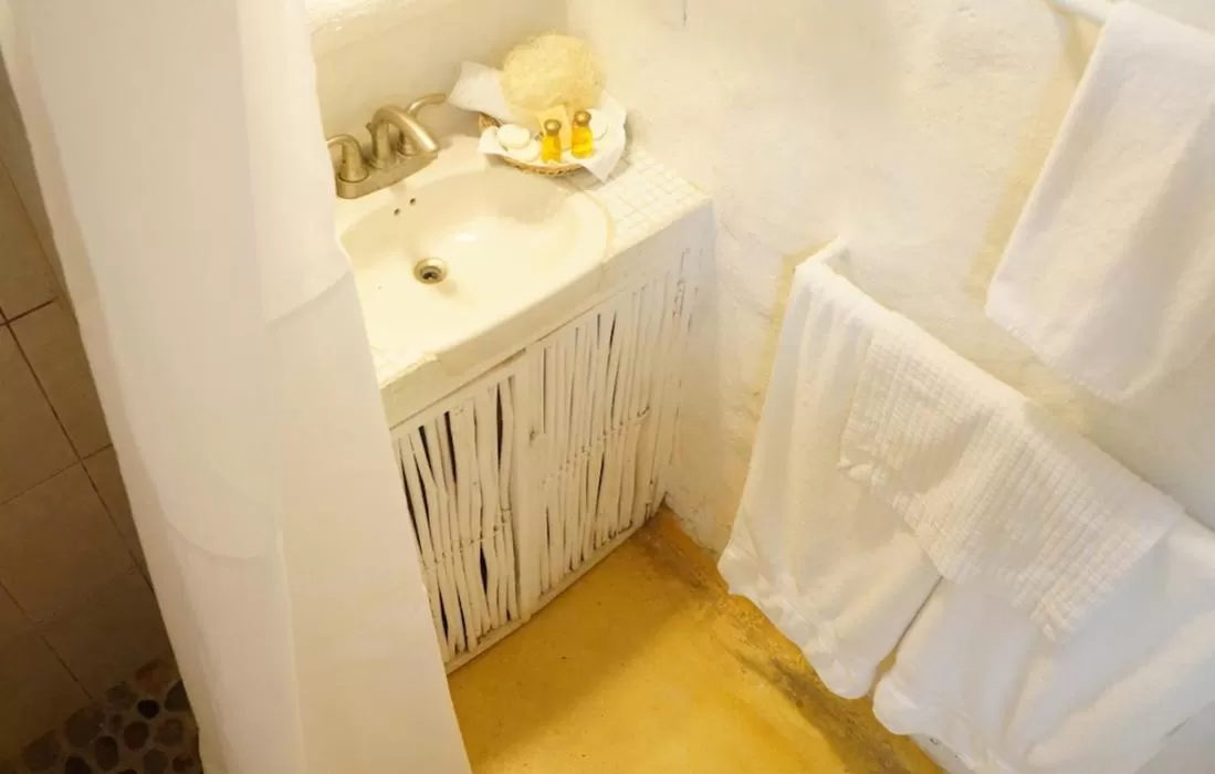 Bed in Junto al Rio Bungalows & Suites