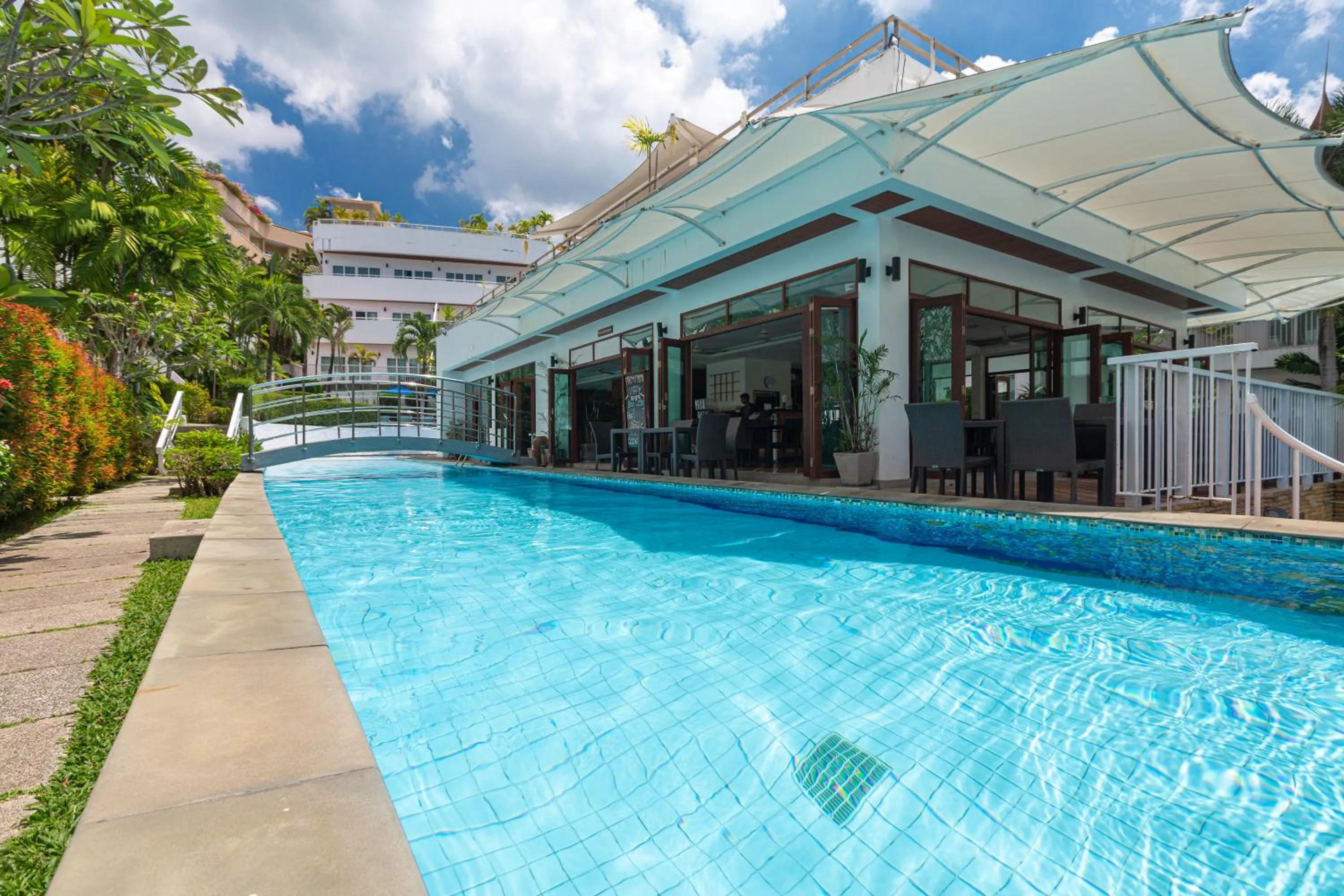 Swimming pool in Phunawa Resort Phuket Karon Beach - SHA Plus