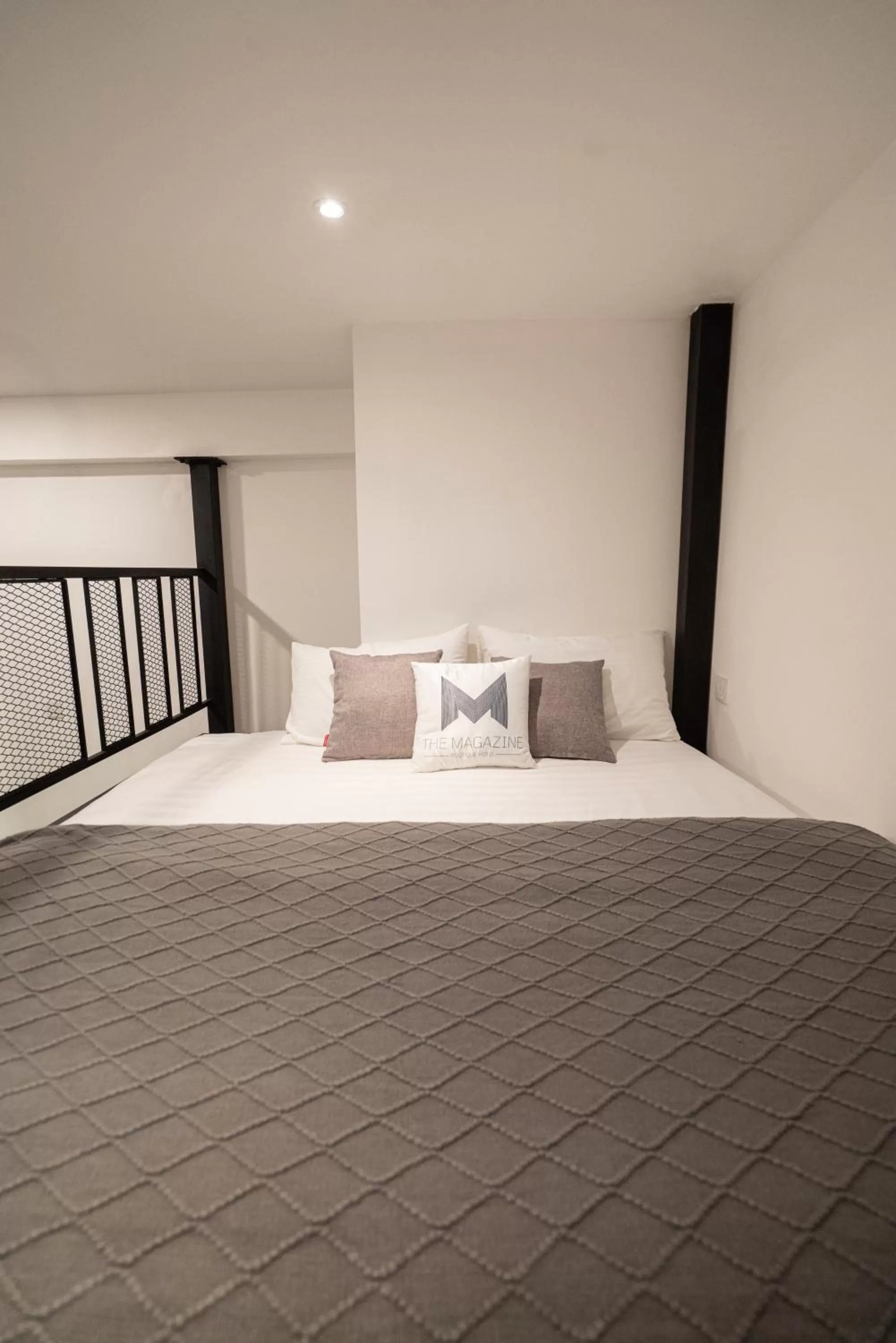 Bed in The Magazine Boutique Hotel