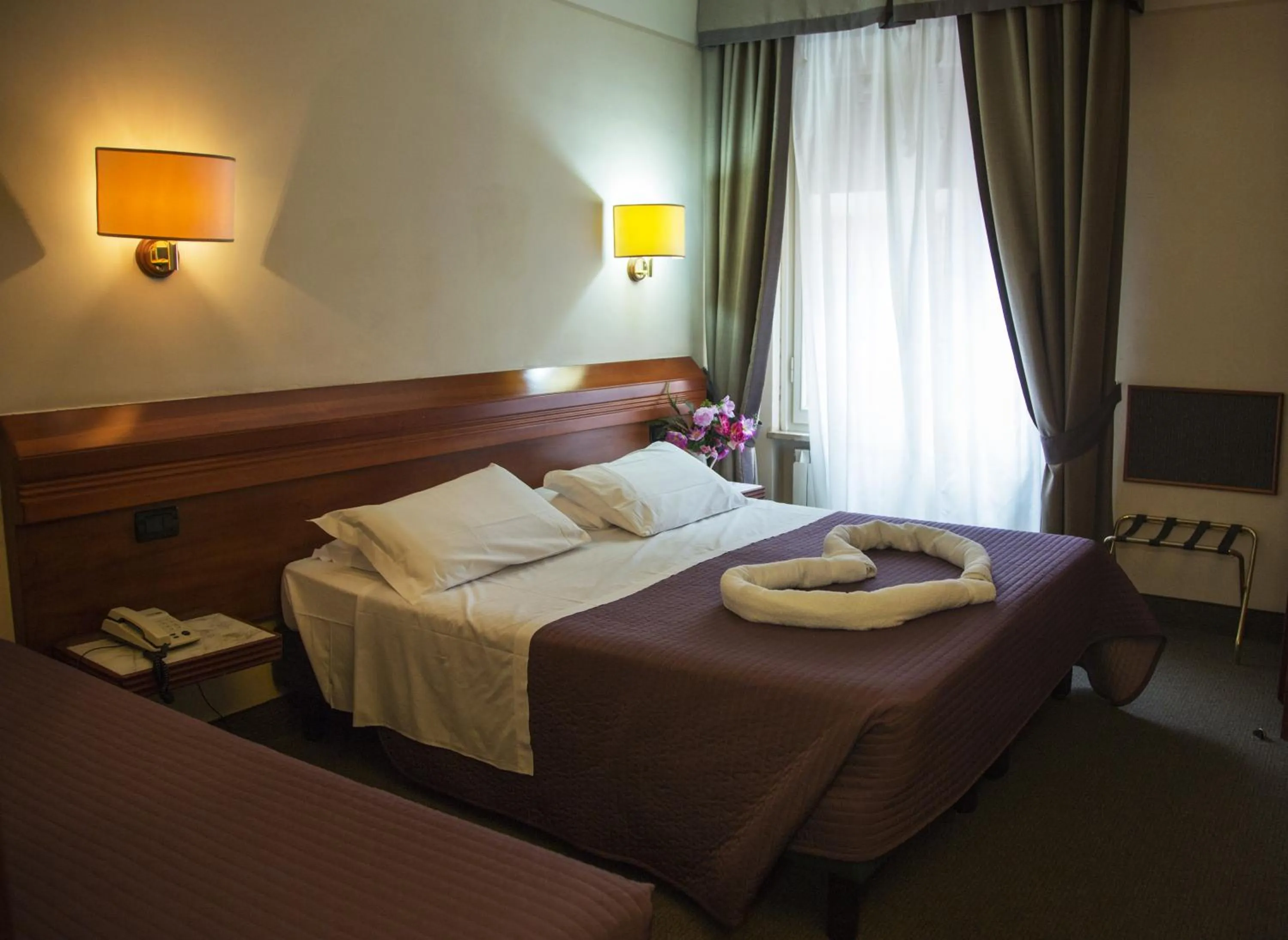 Bed in Hotel Arcadia