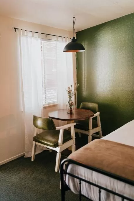 Seating area, Bed in The Long Barn Lodge