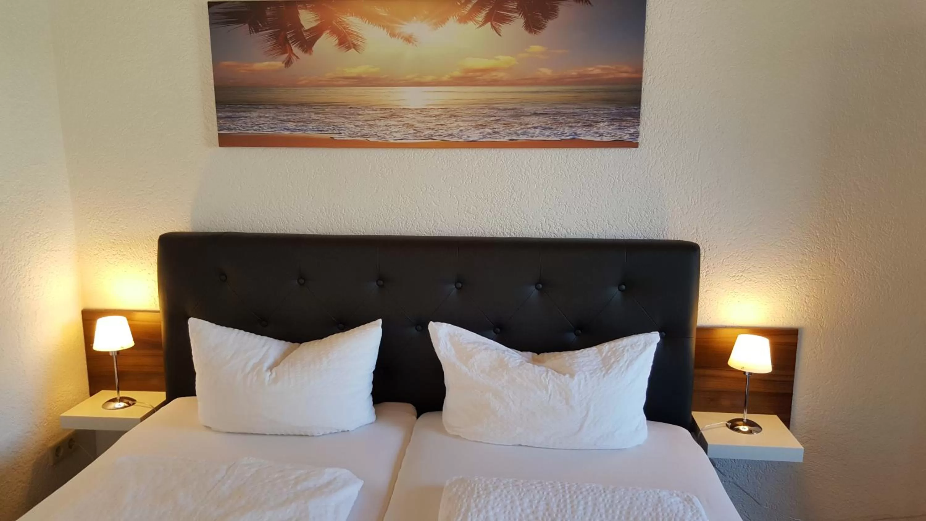 Bed in Hotel Exquisite