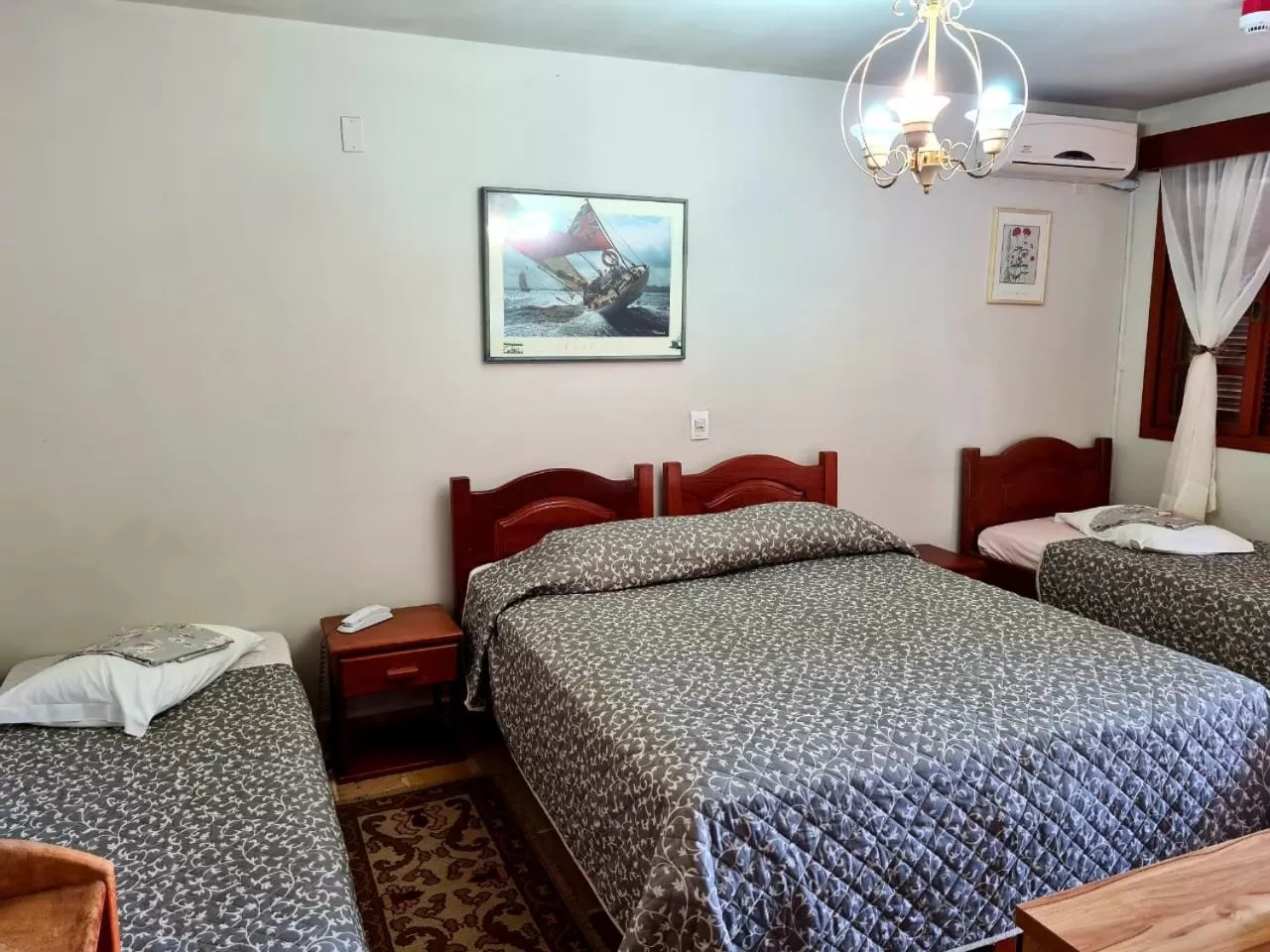 Bed in Bartholo Plaza Hotel