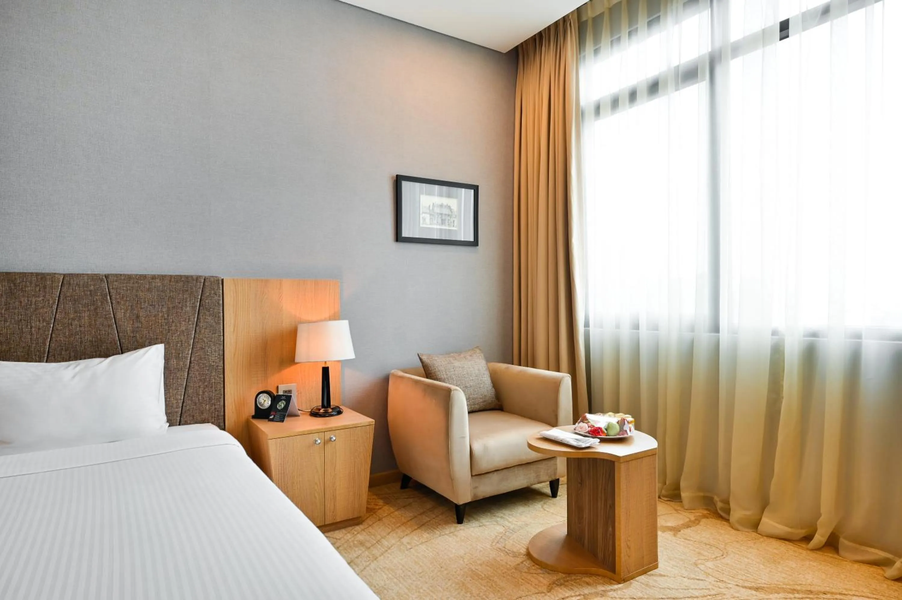 Seating area, Bed in Muong Thanh Grand Saigon Centre Hotel