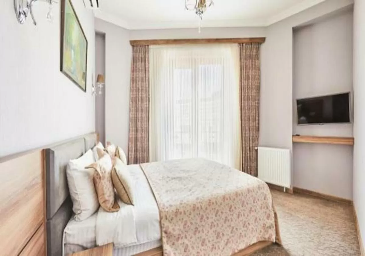 Bed in Hotel Pushkin