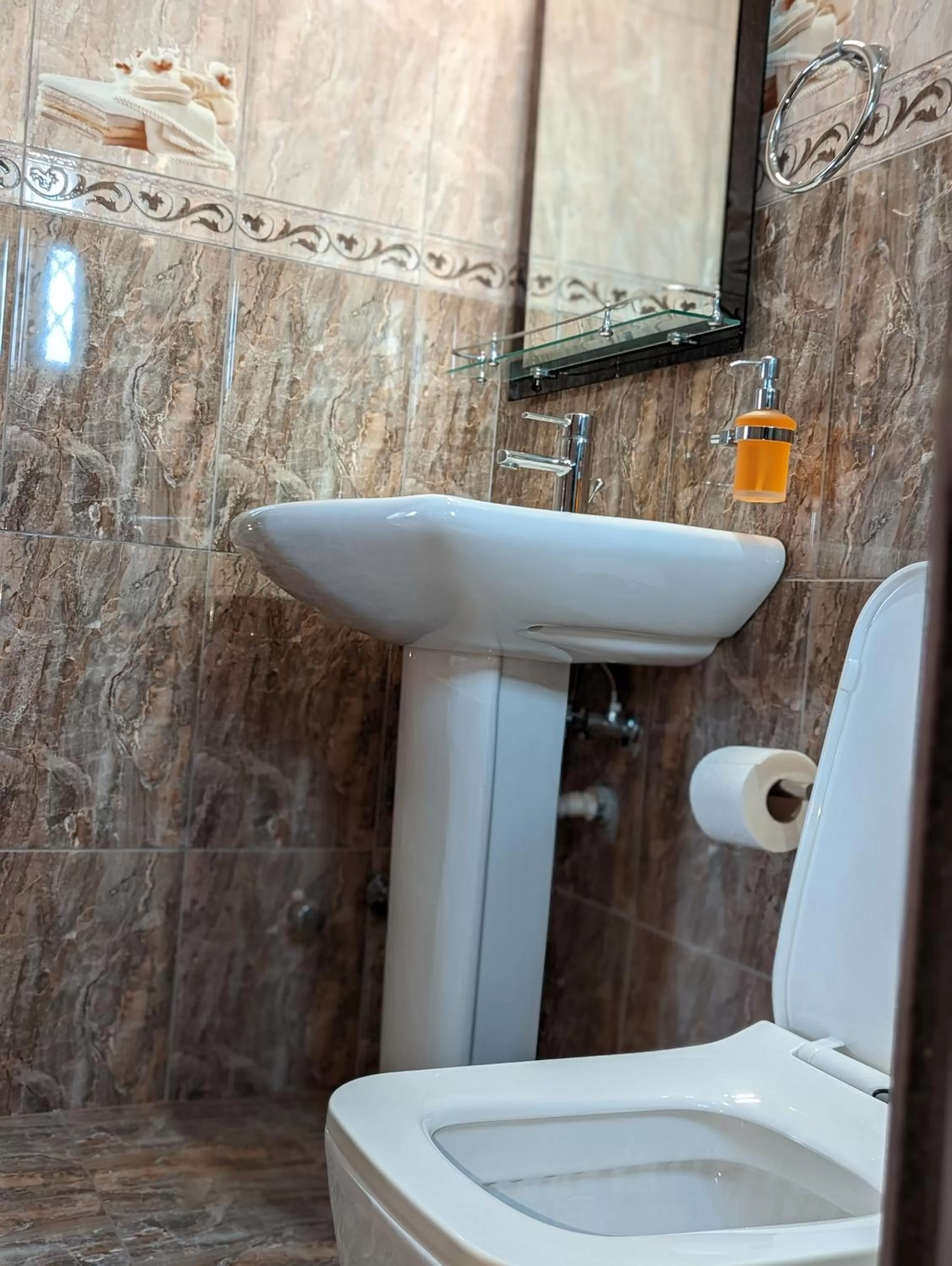 Toilet in KoKo Palm Inn LTD