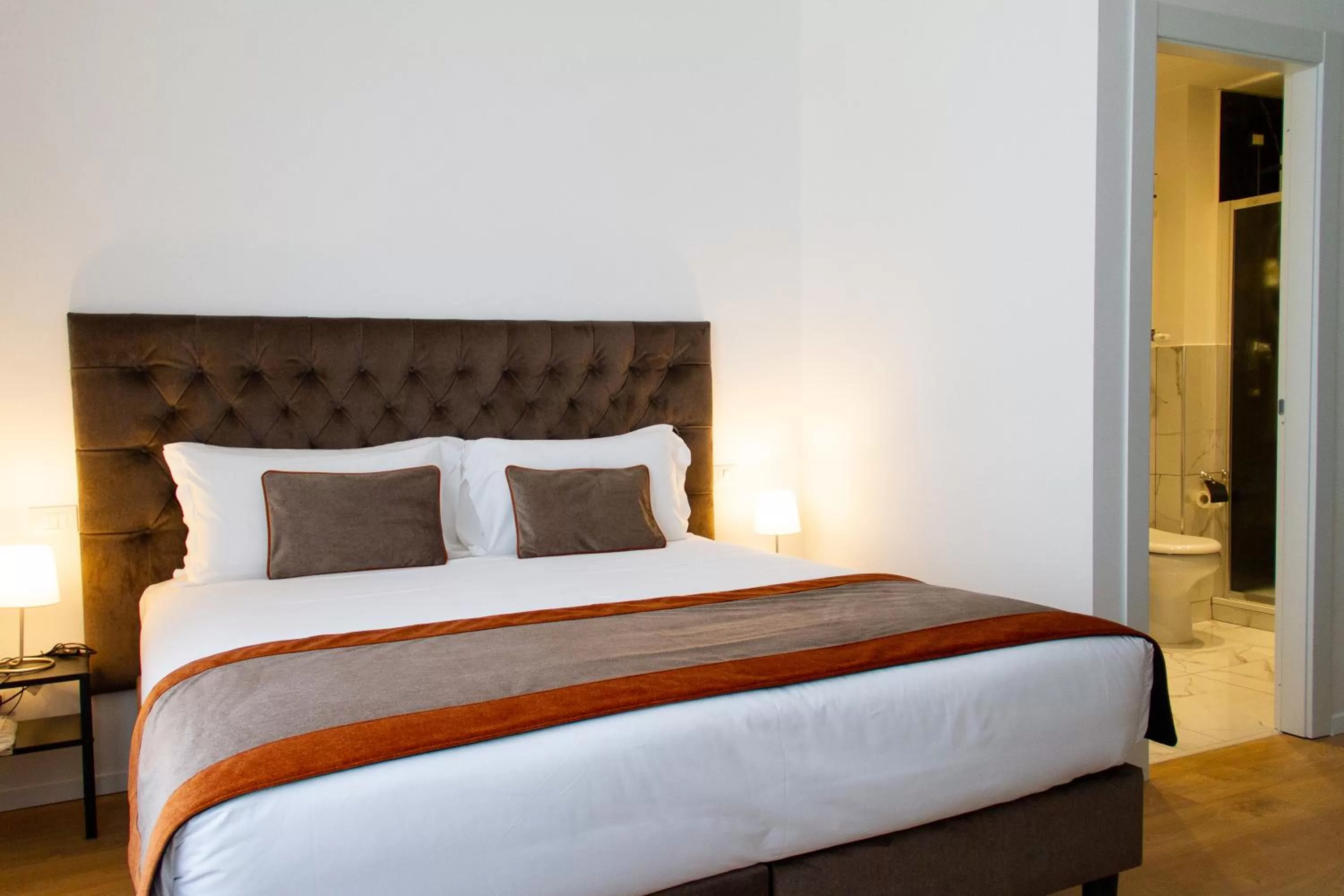 Bed in Michelangelo Vatican Rooms