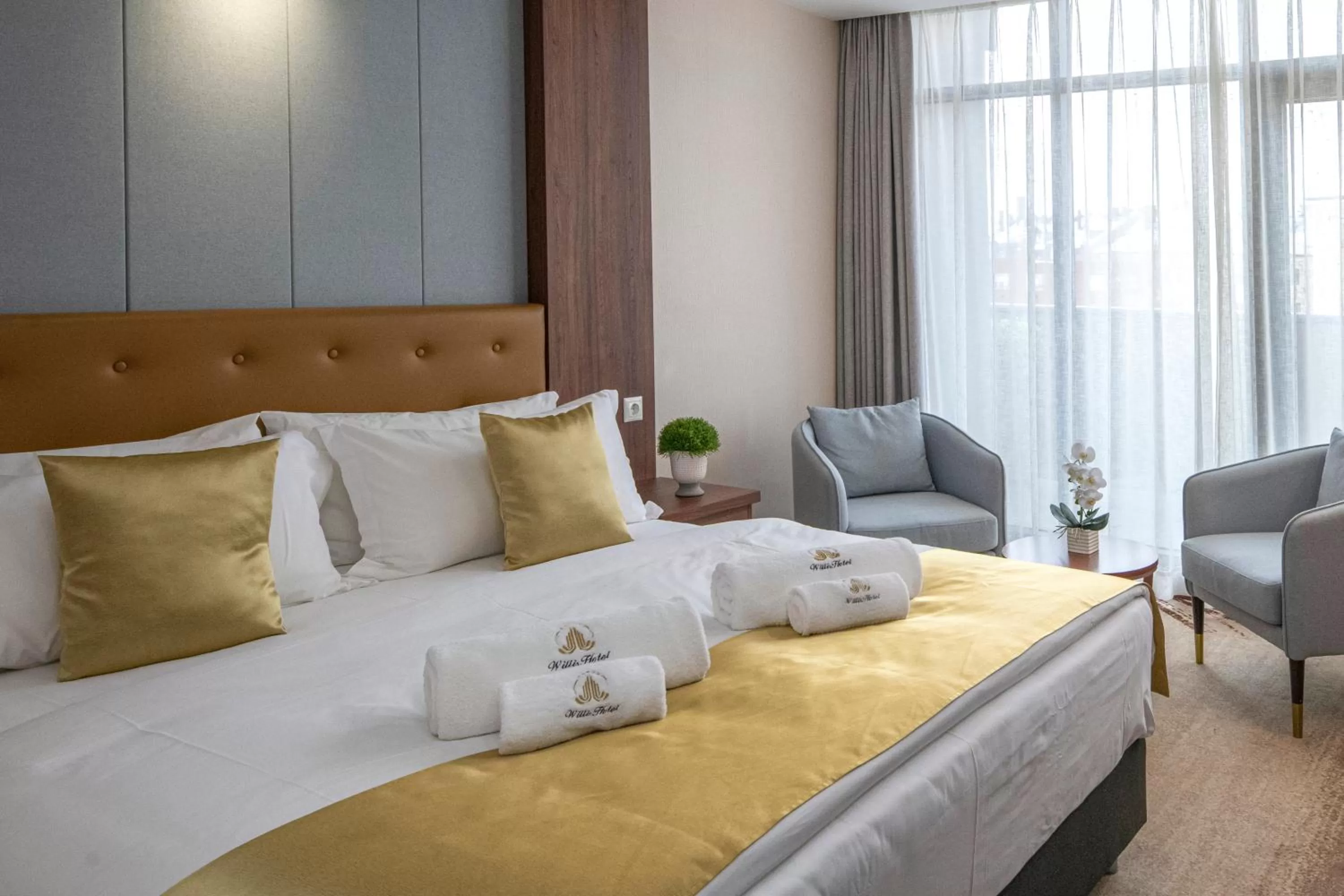 Bed in Willis Hotel Business & Wellness