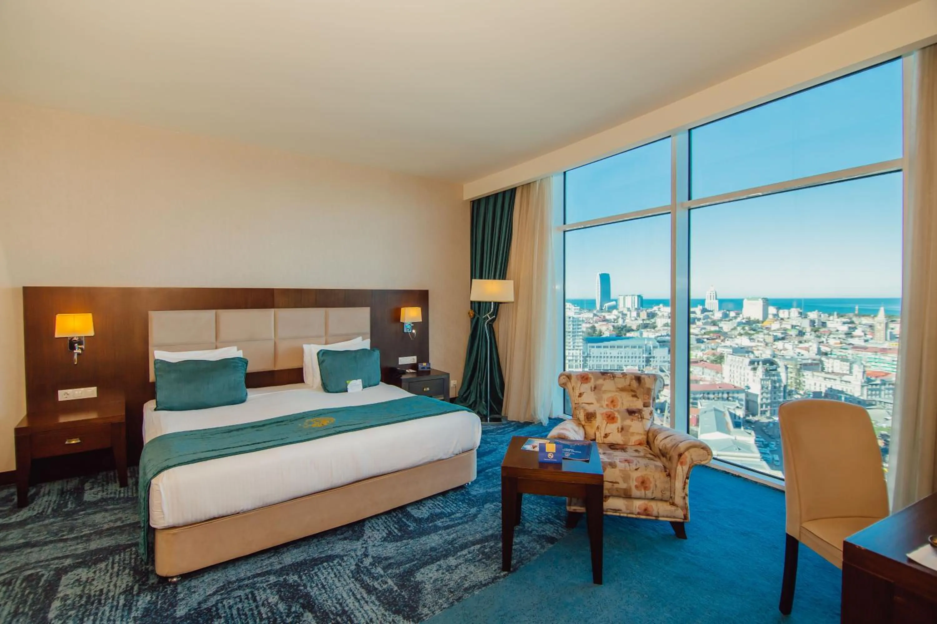 Bed in JRW Welmond Hotel