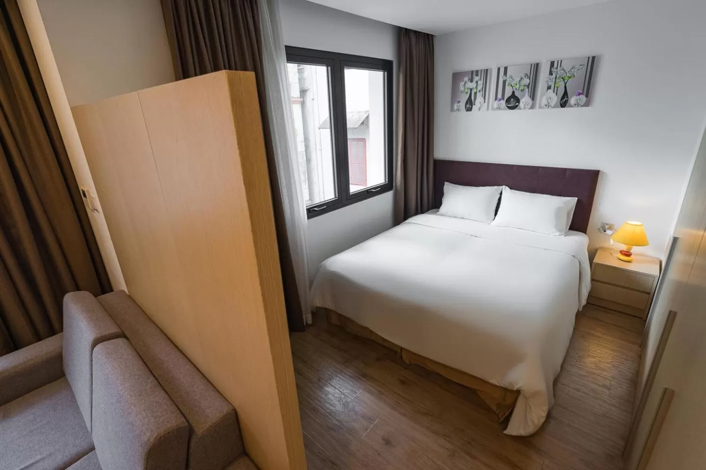 Bed in HNC Premier Hotel & Residences