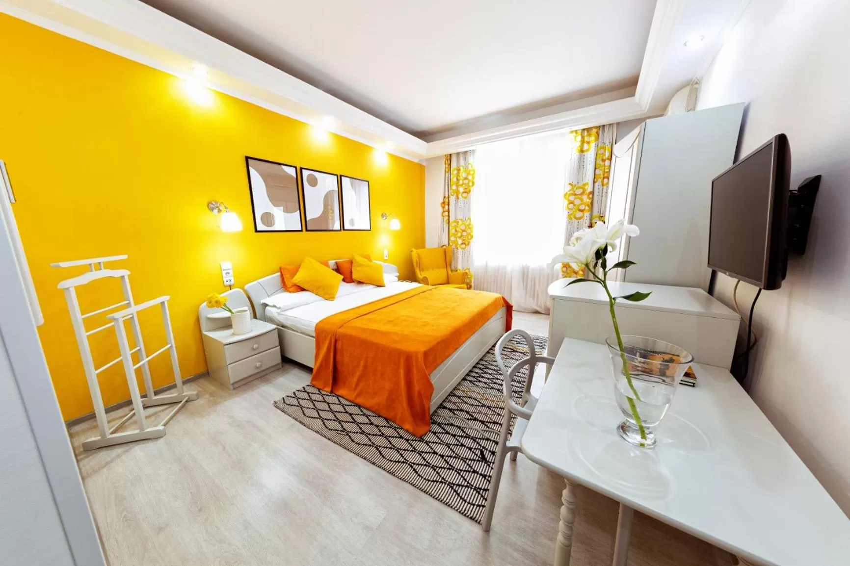 Bed in Relax Comfort Suites Hotel