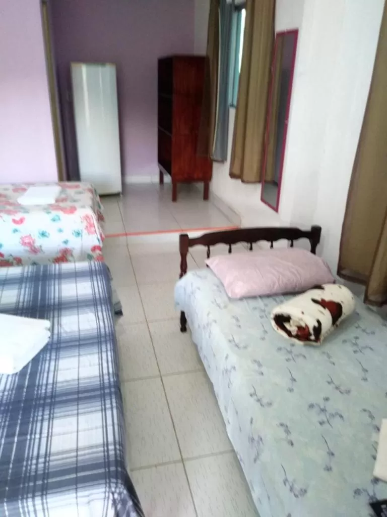 Bed in Pousada dos Ventos