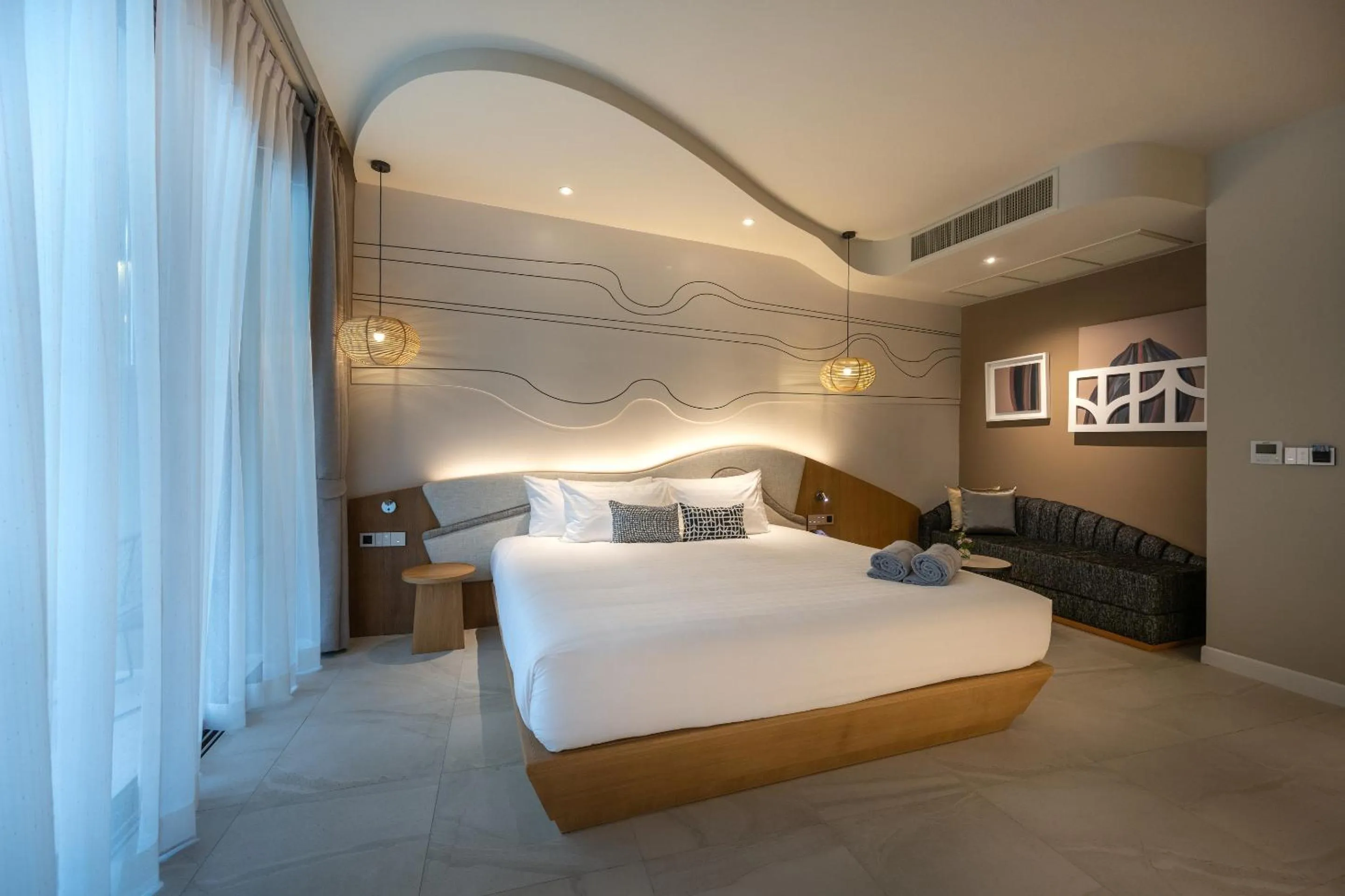 Bed in Metadee Concept Hotel