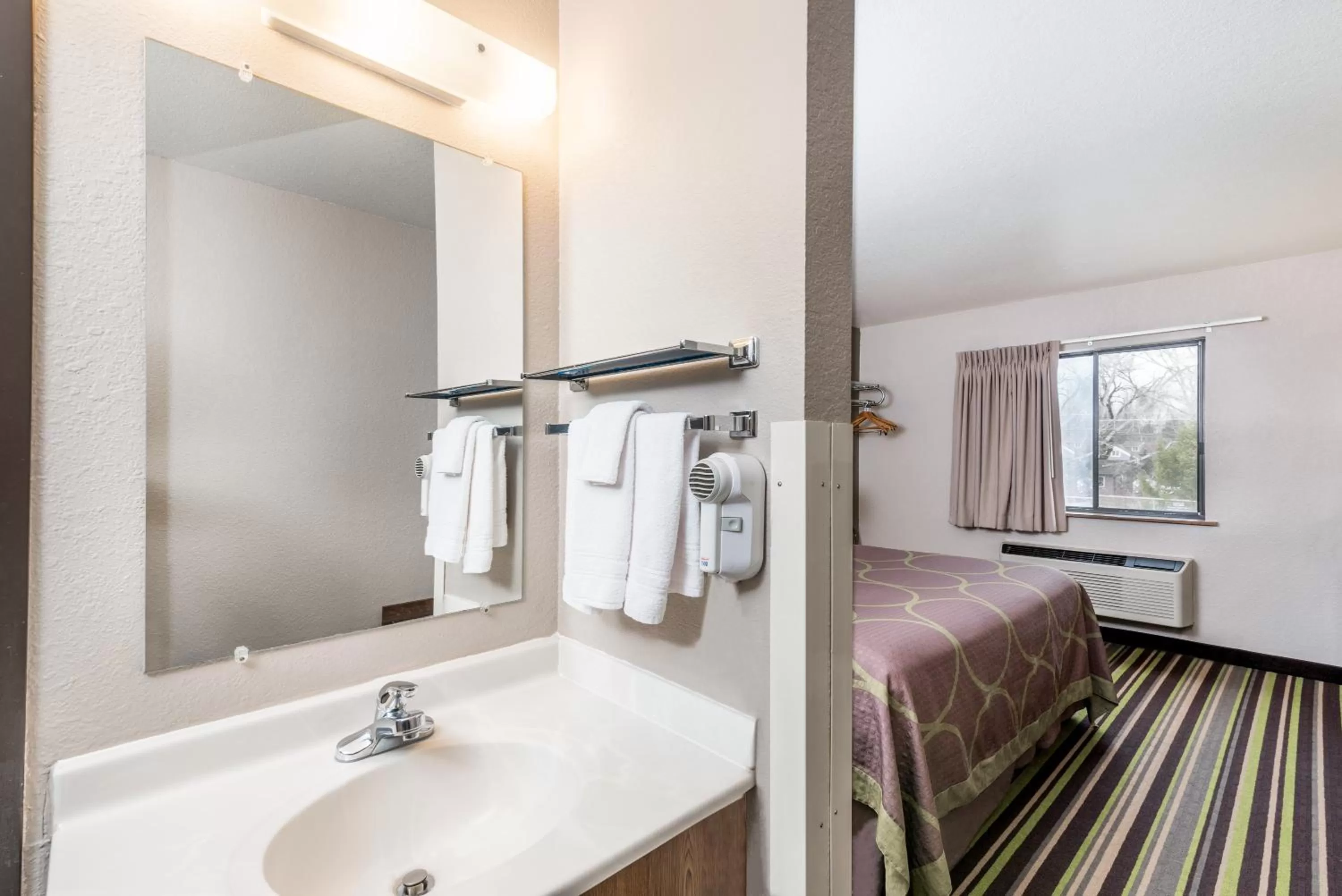 Bathroom, Bed in Super 8 by Wyndham Kalispell Glacier National Park