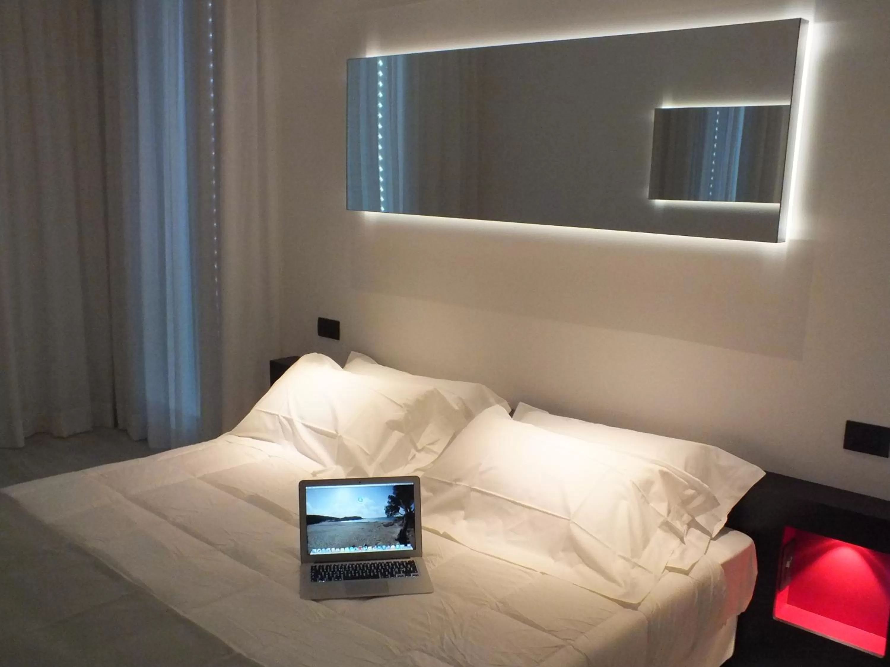 Bed in Blue Shades Hotel