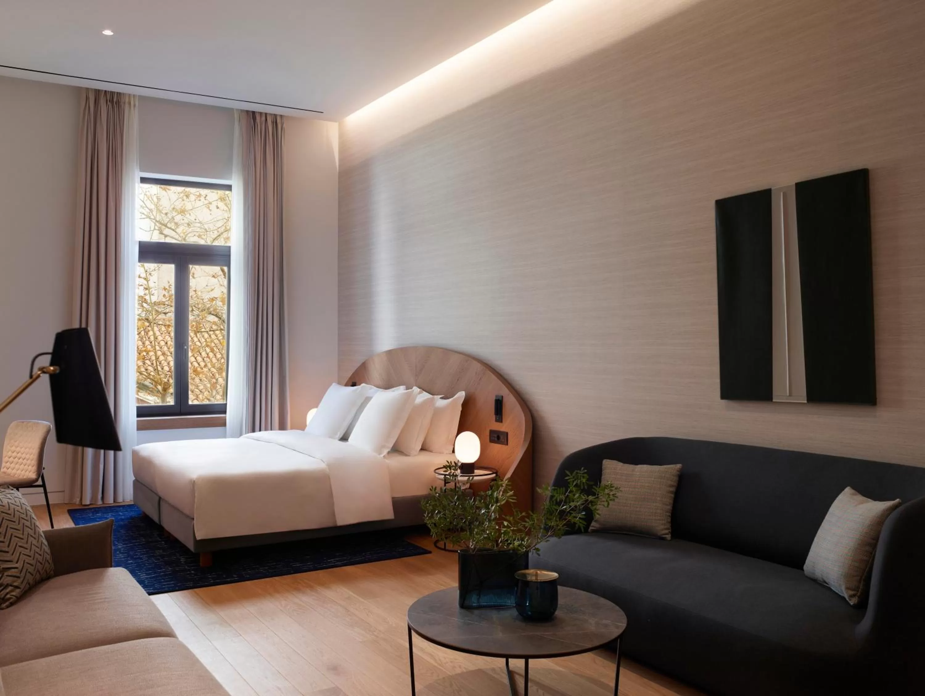 Seating area in xenodocheio Milos