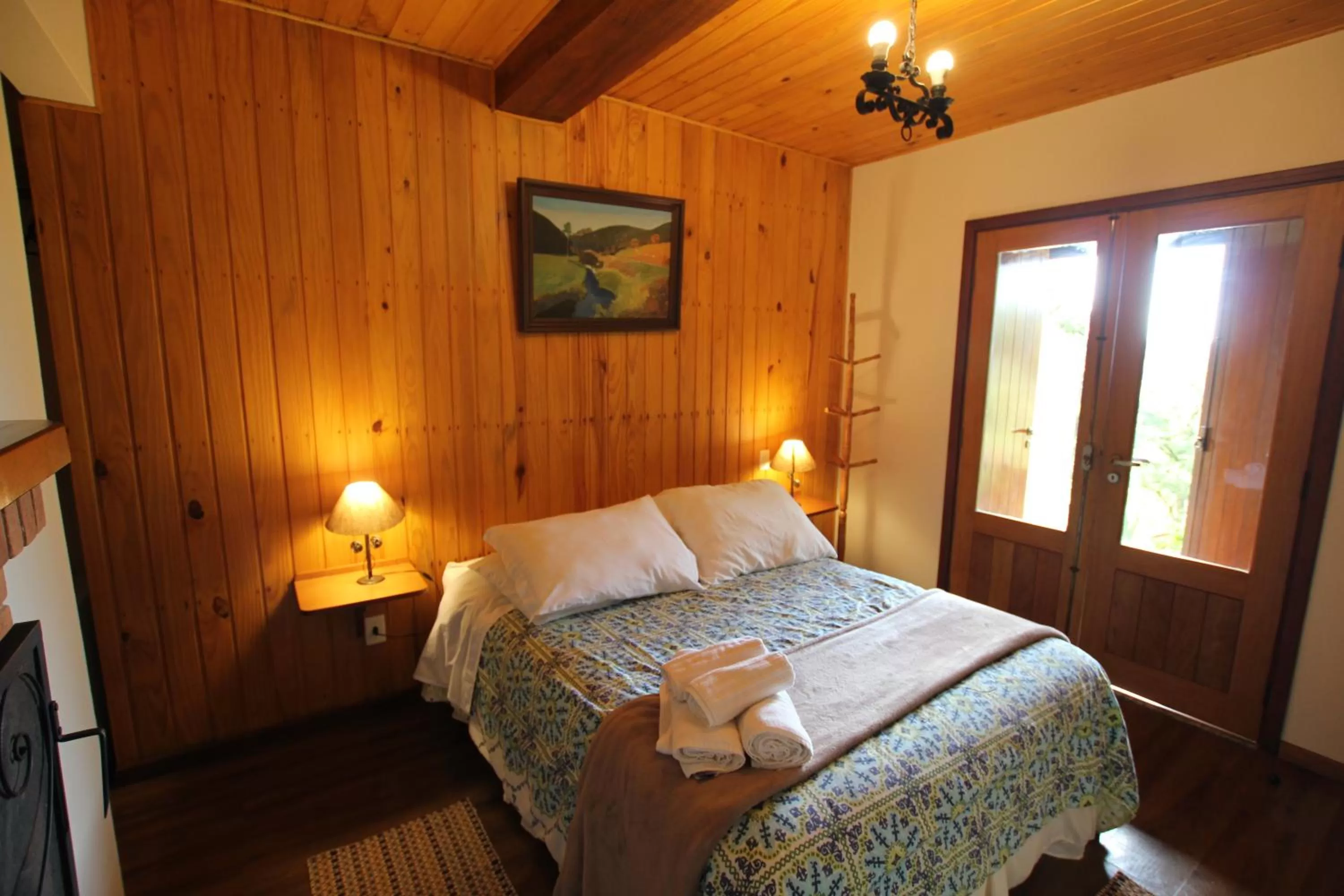 Bed in Pousada Aguia da Montanha