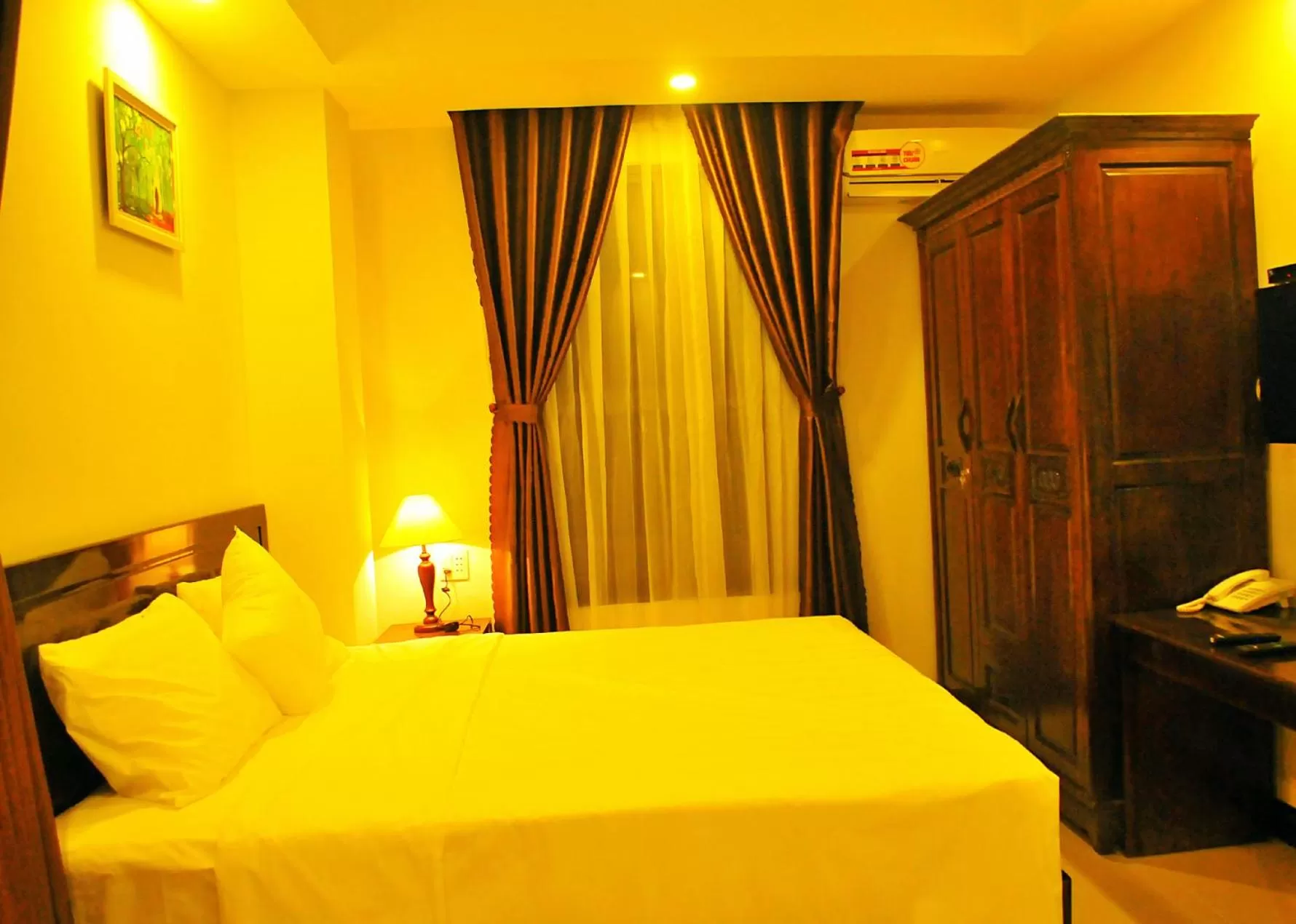 Bed in Aries Hotel