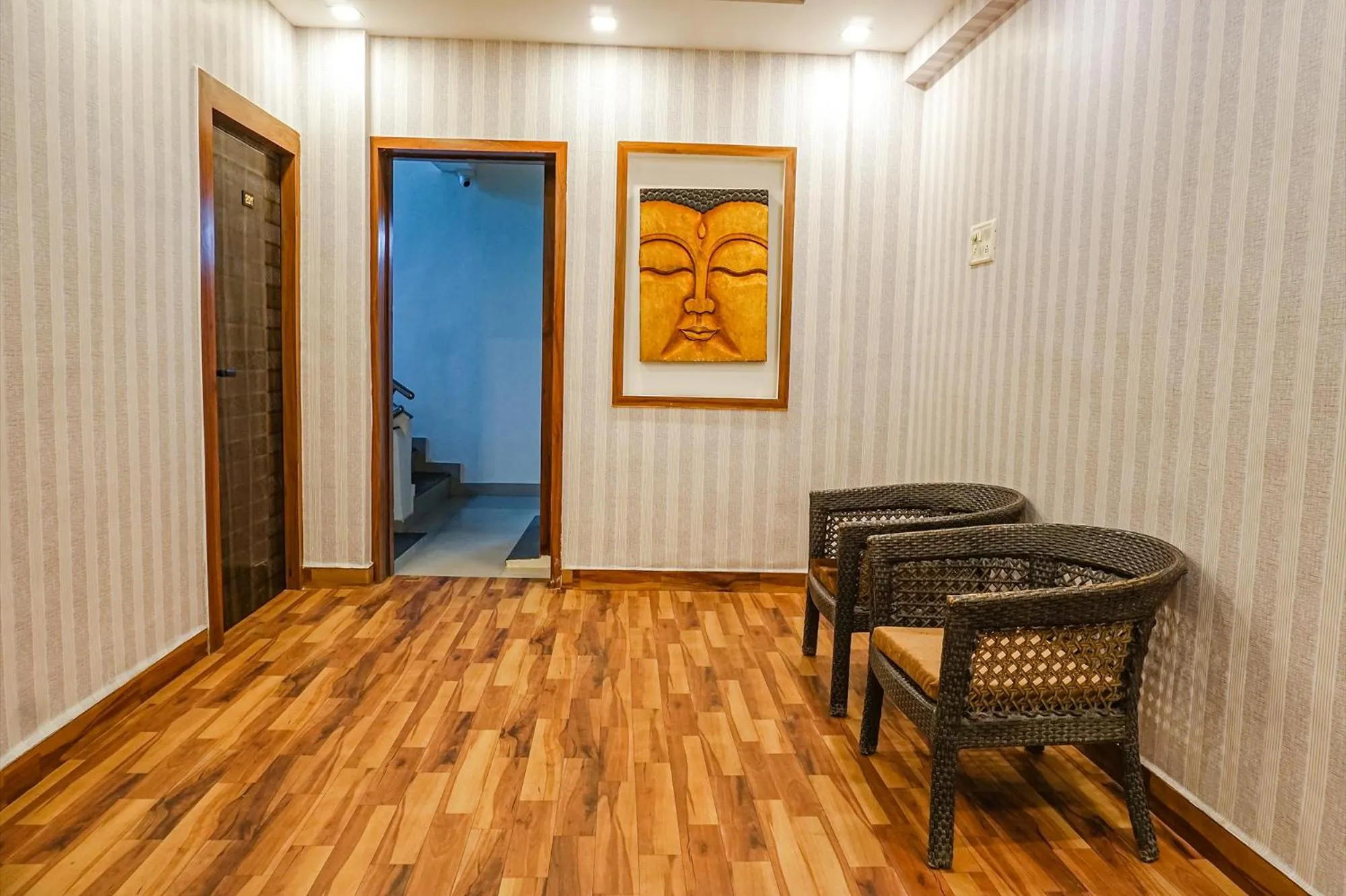 Seating area in FabHotel Tan Square - Nr Eon IT Park