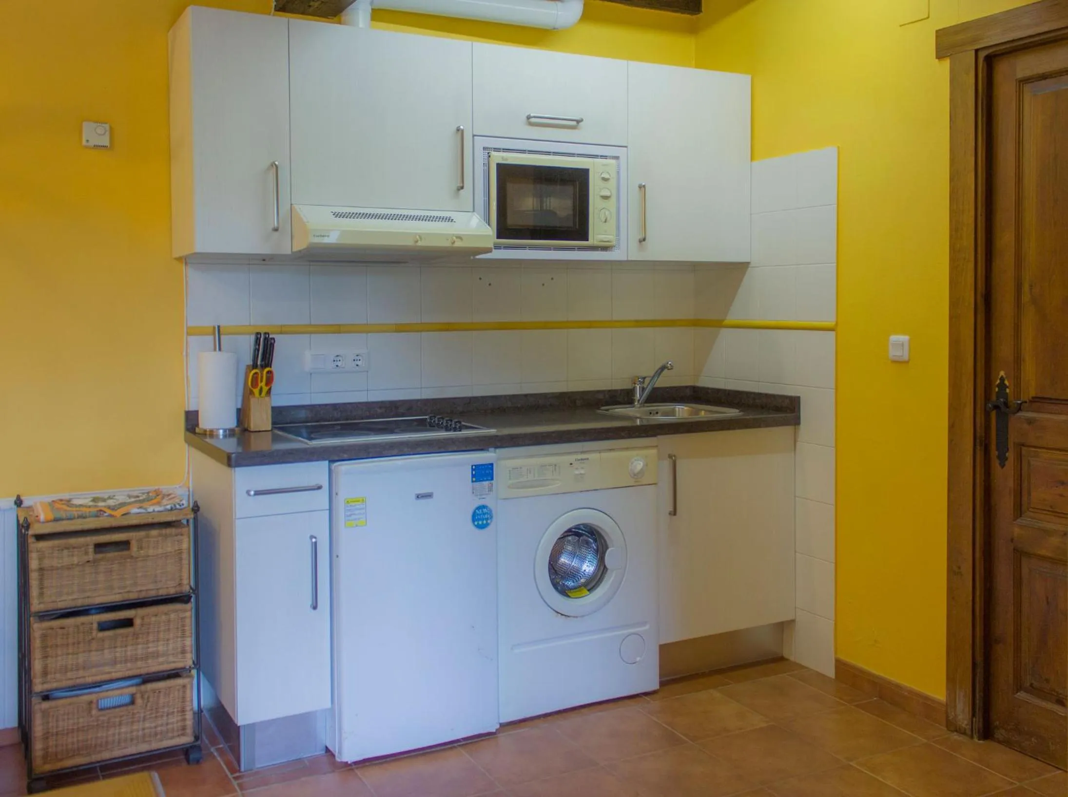 Kitchen or kitchenette in Viviendas Rurales El Covaju