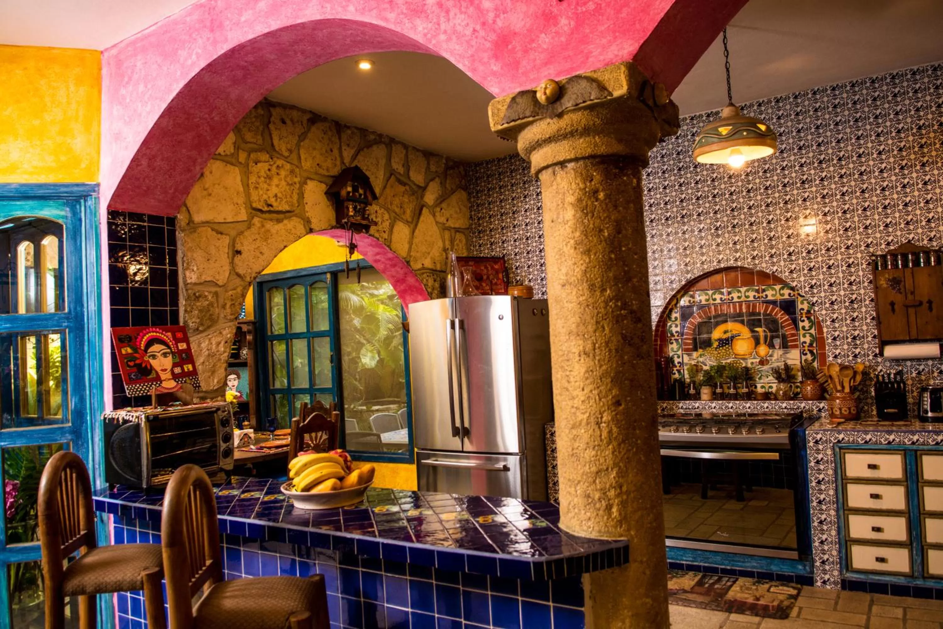 Communal kitchen in Hacienda Boutique B&B and Spa Solo Adultos