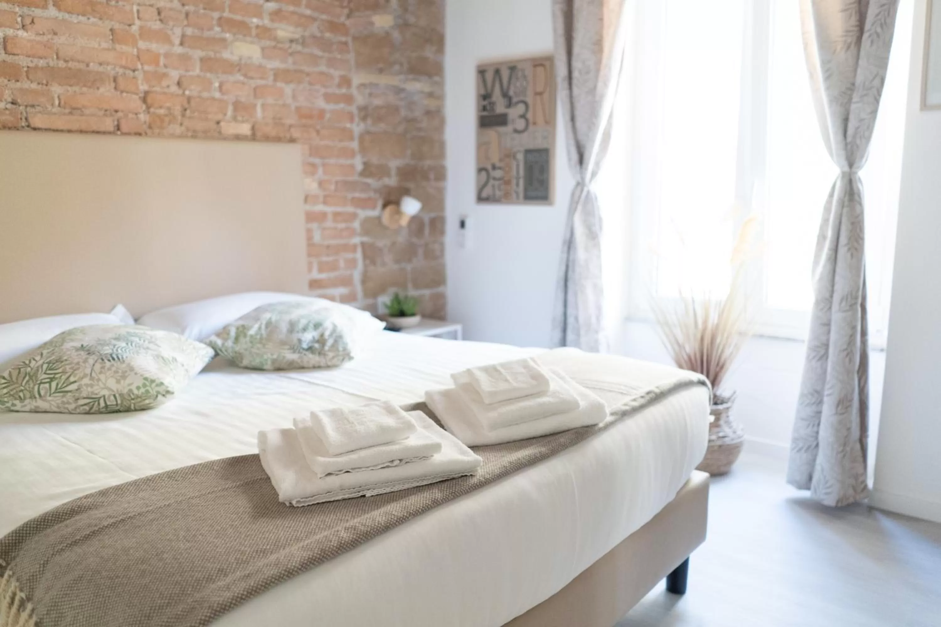 Bed in White Ostilia B&B