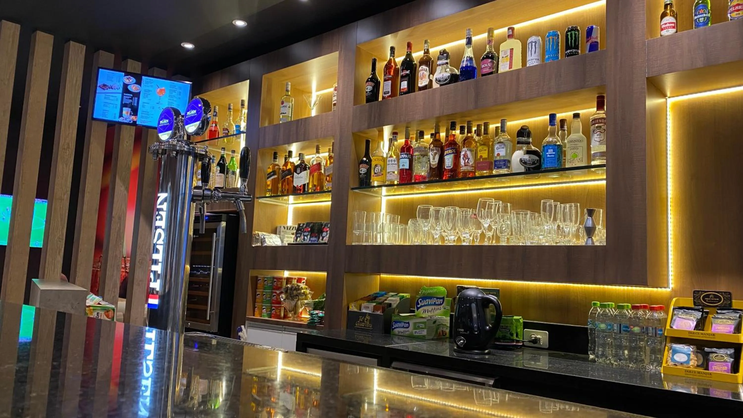 Lounge or bar in ibis Asuncion