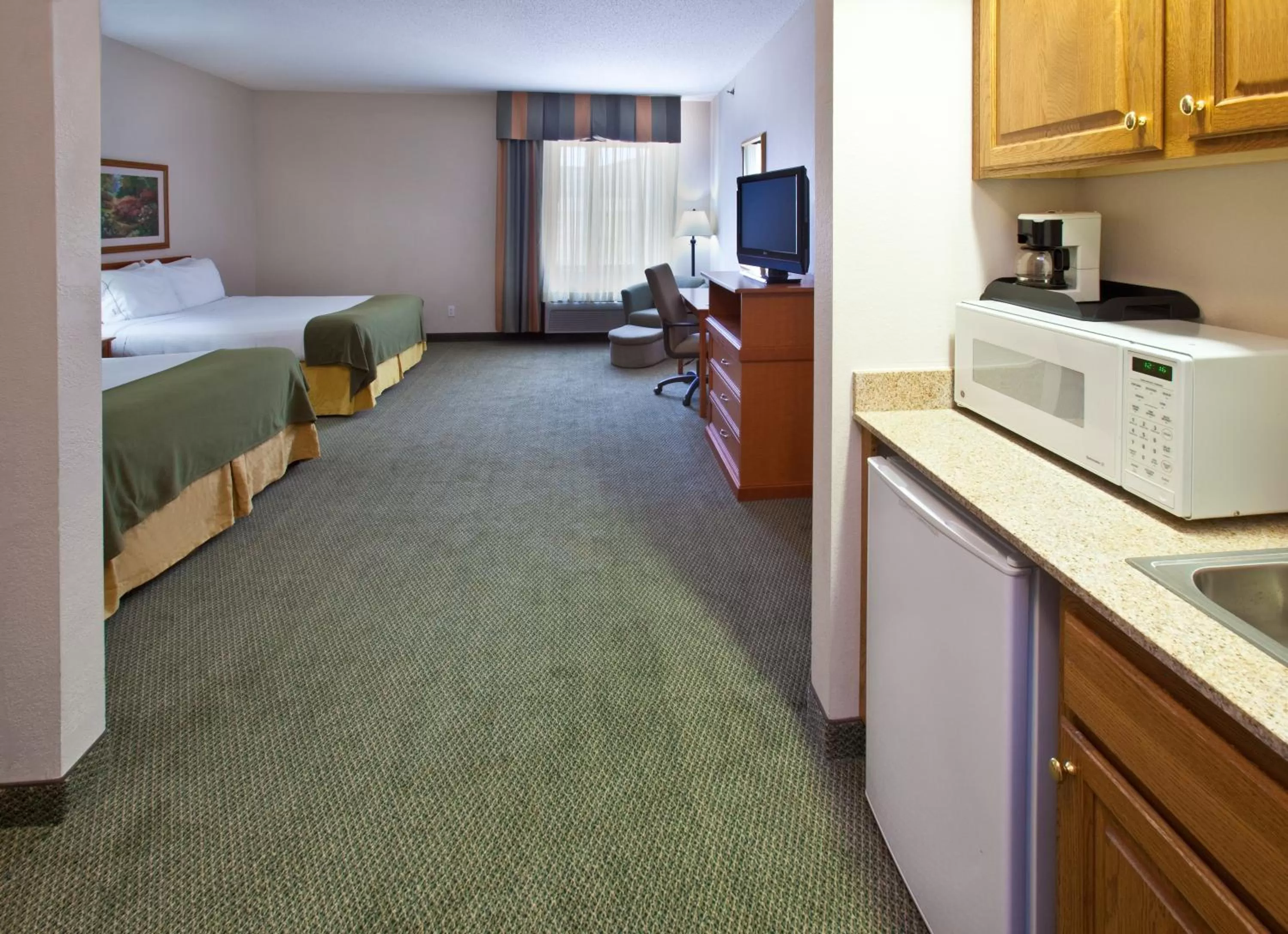 Photo of the whole room, Bed in GrandStay Hotel & Suites Pella