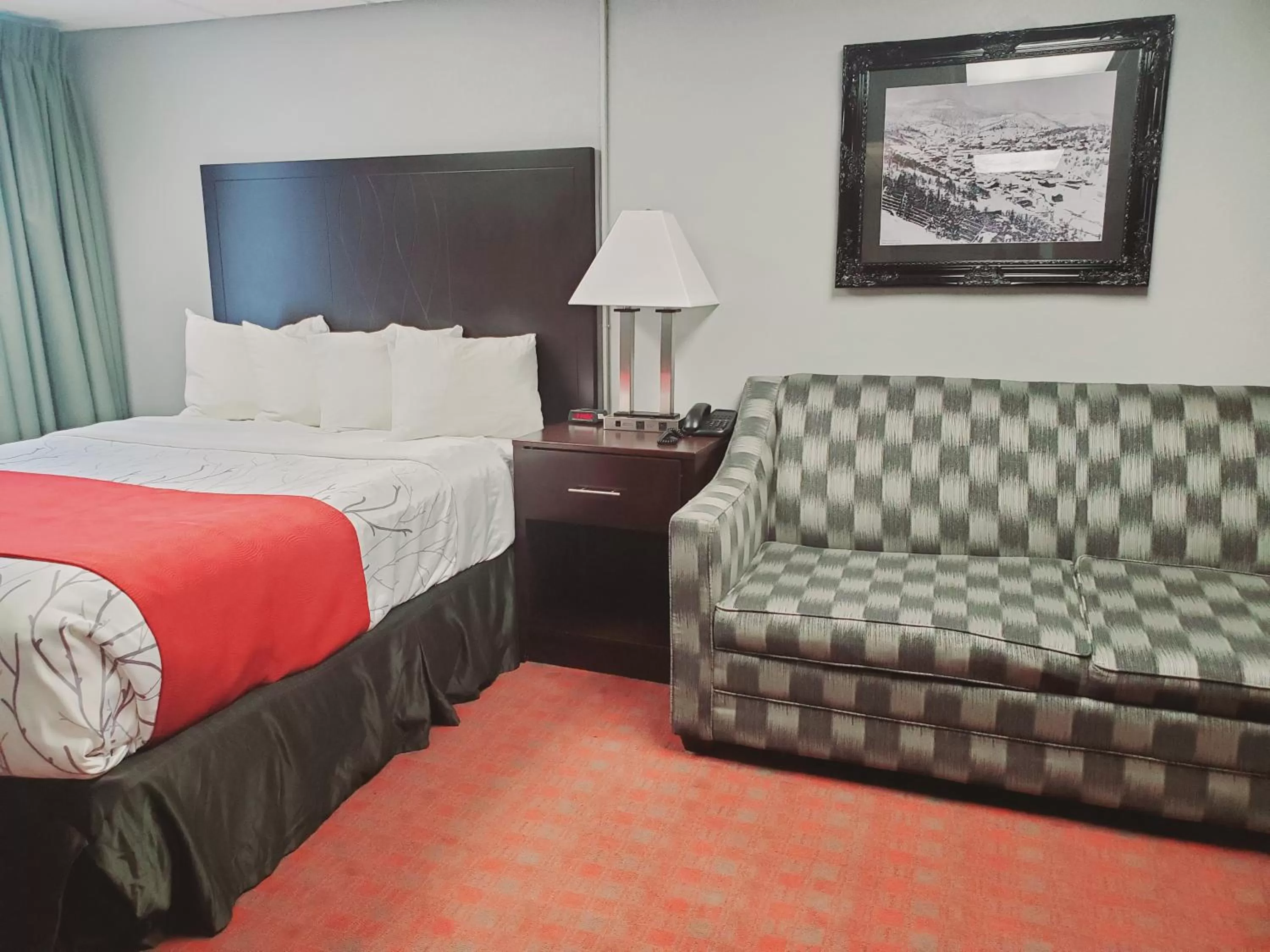 Bed in Blackstone Lodge and Suites